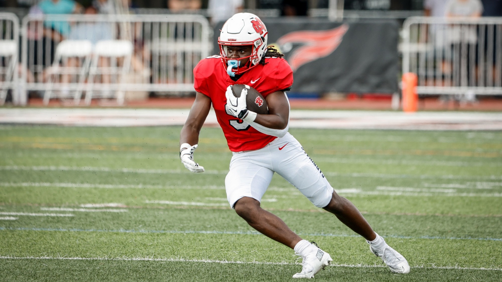 Galashky Blaise running the football vs Augustana