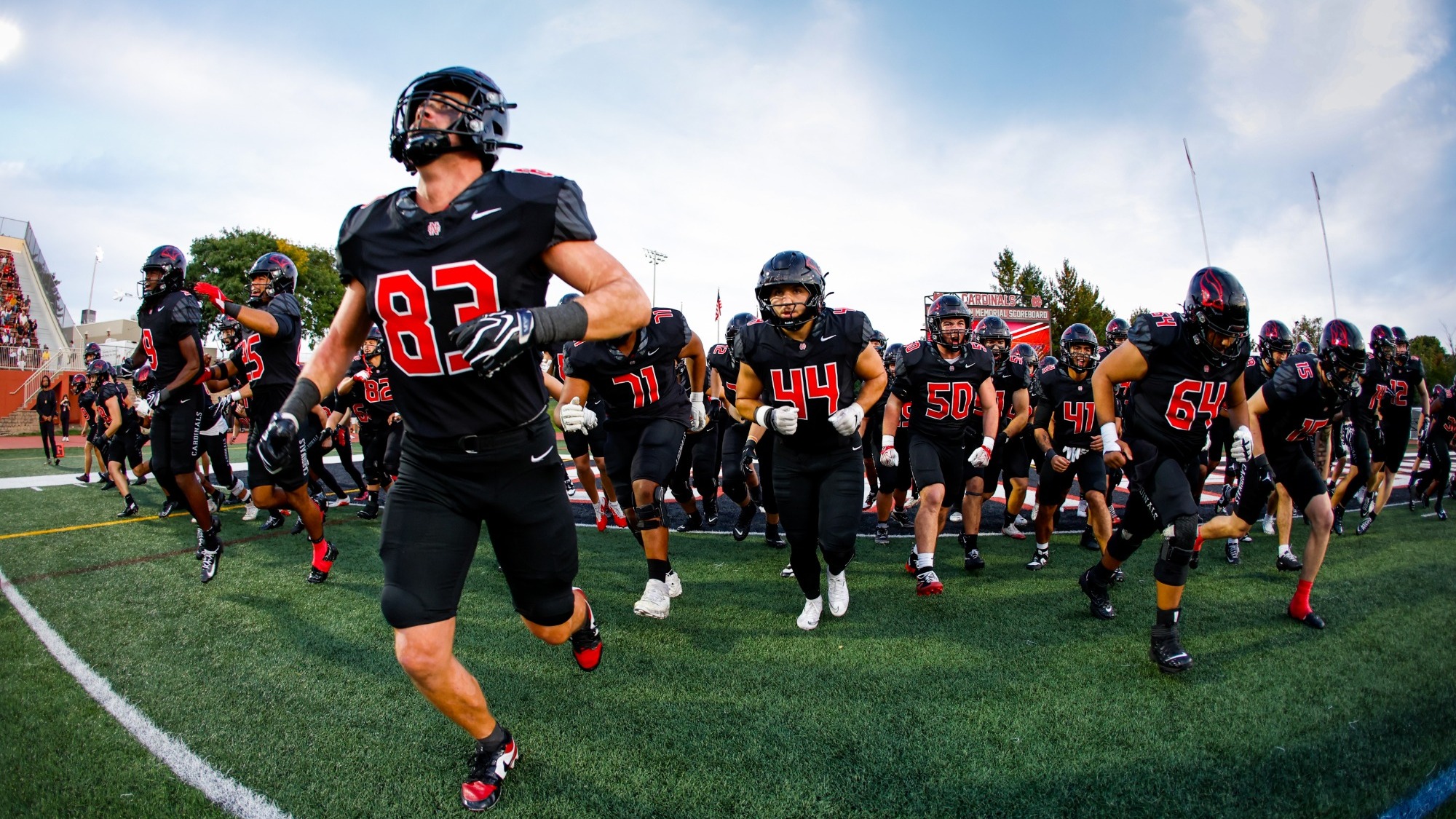 North Central Football running on the field