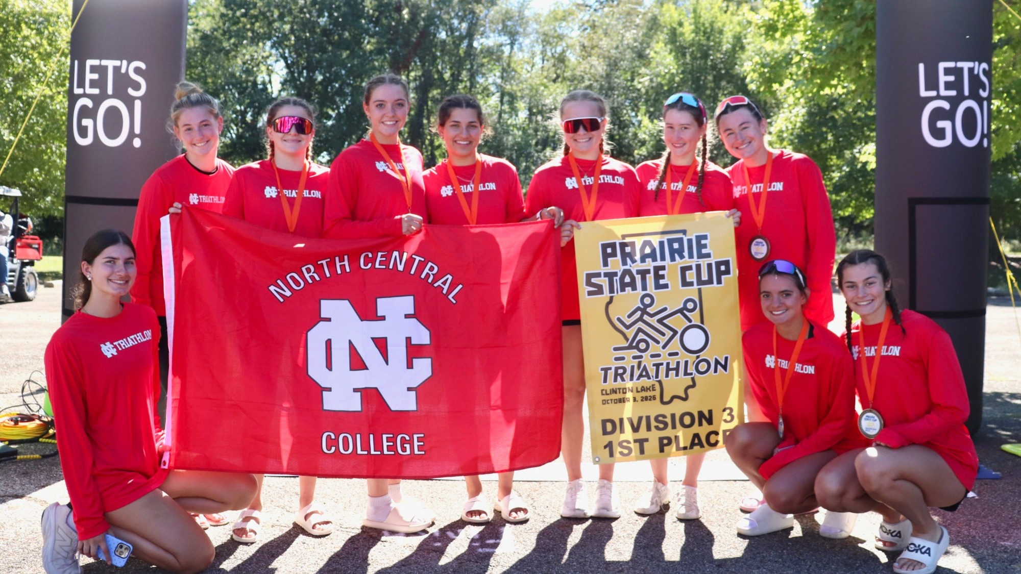 The North Central College women's triathlon team posing with their first place Division III title at the Prairie State Cup Oct. 3, 2026.