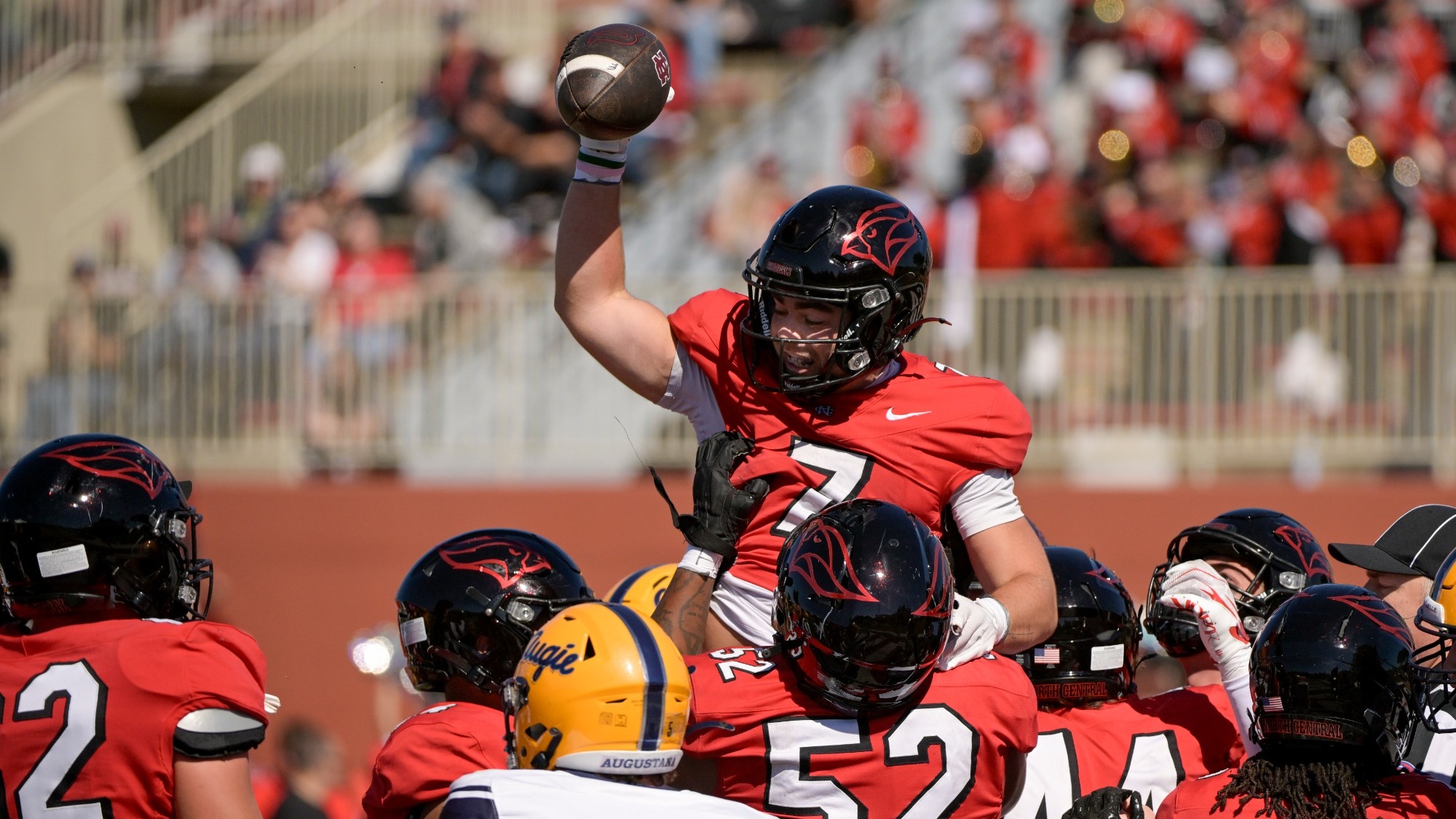 Duke Guenther getting raised up after scoring a touchdown