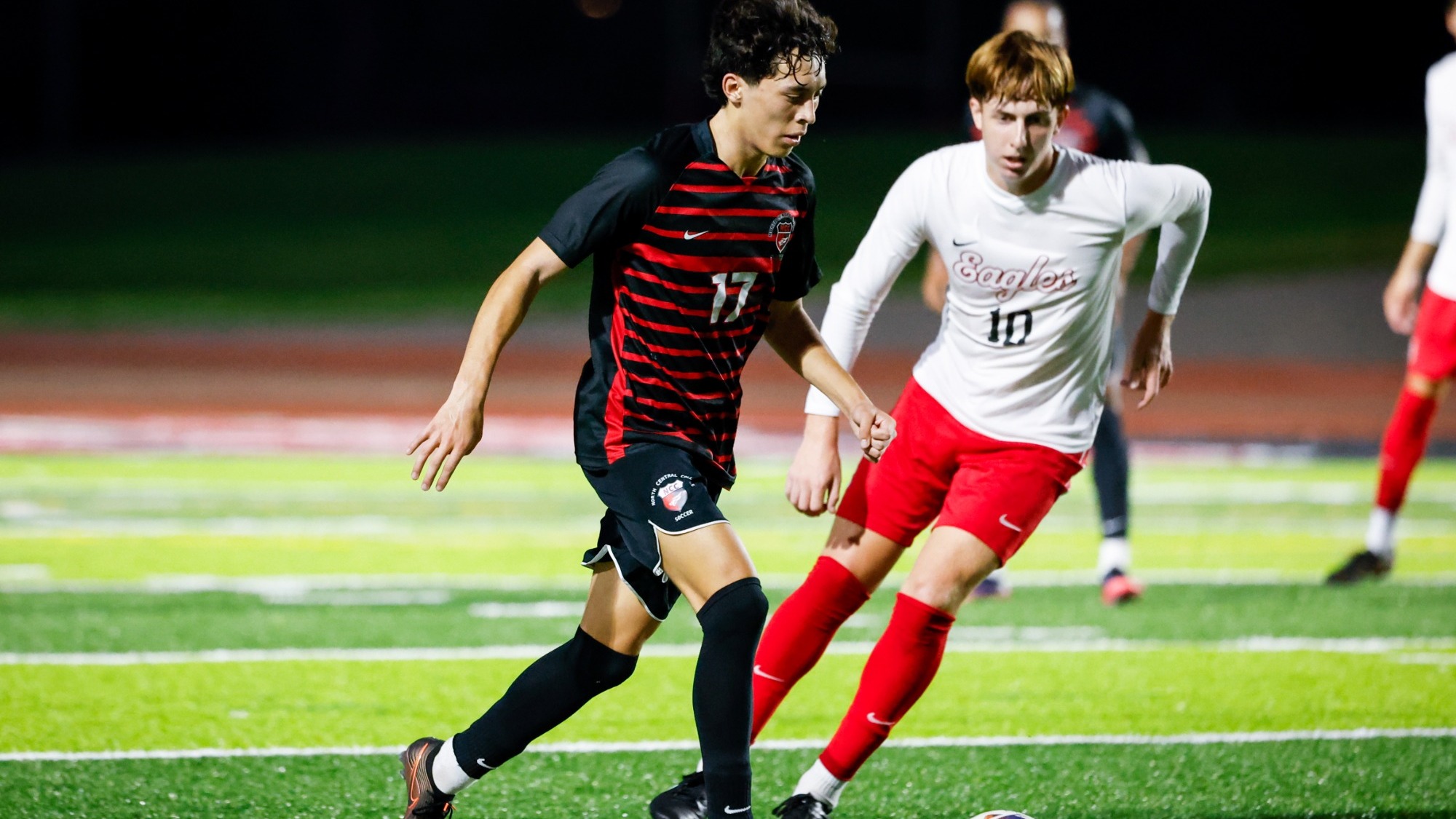 Ivan Hooshman from North Central College men's soccer dribbling against Benedictine University on Sept. 3, 2026.