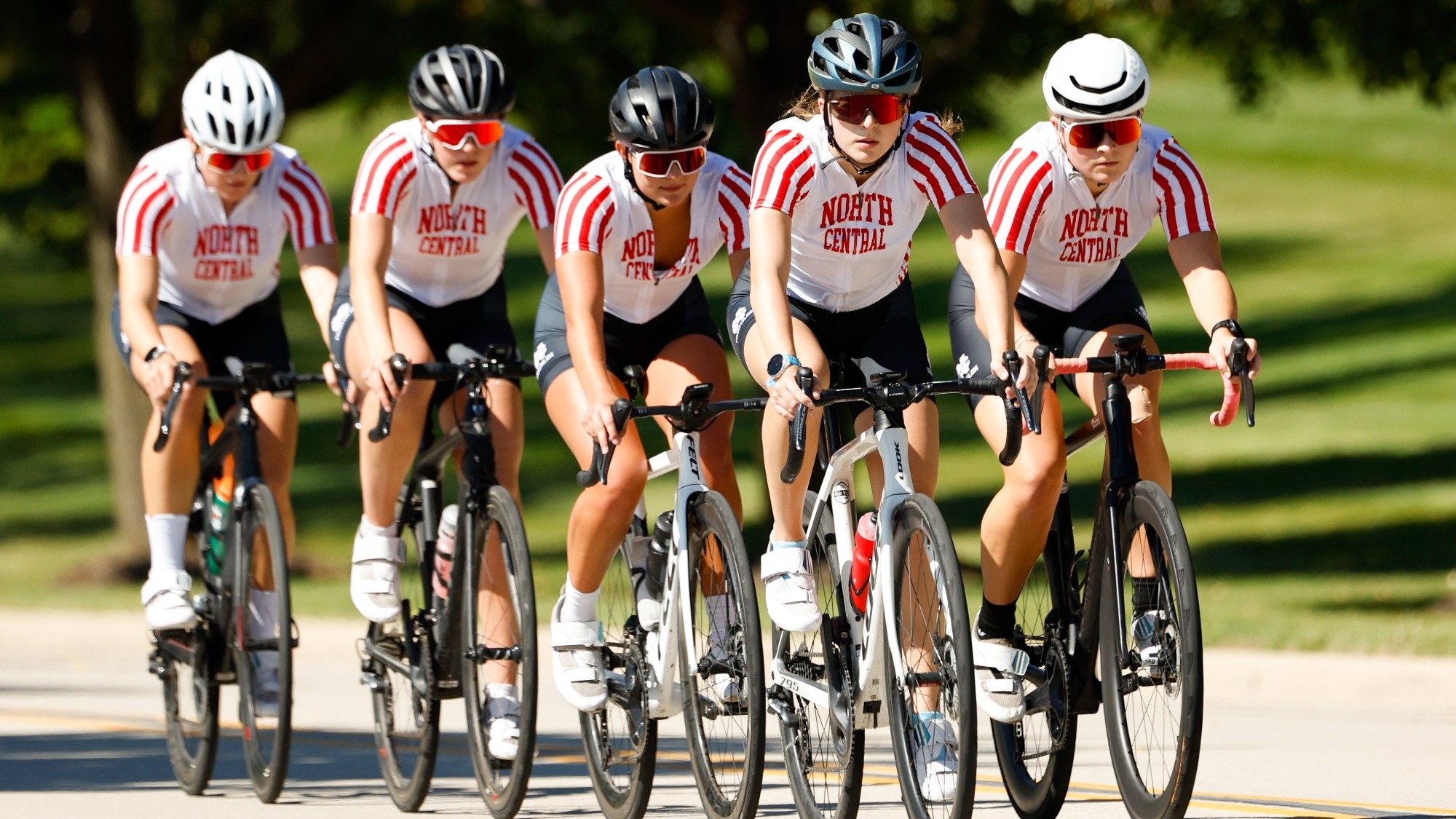 The North Central College women's triathlon team biking on Sept. 16, 2026. 