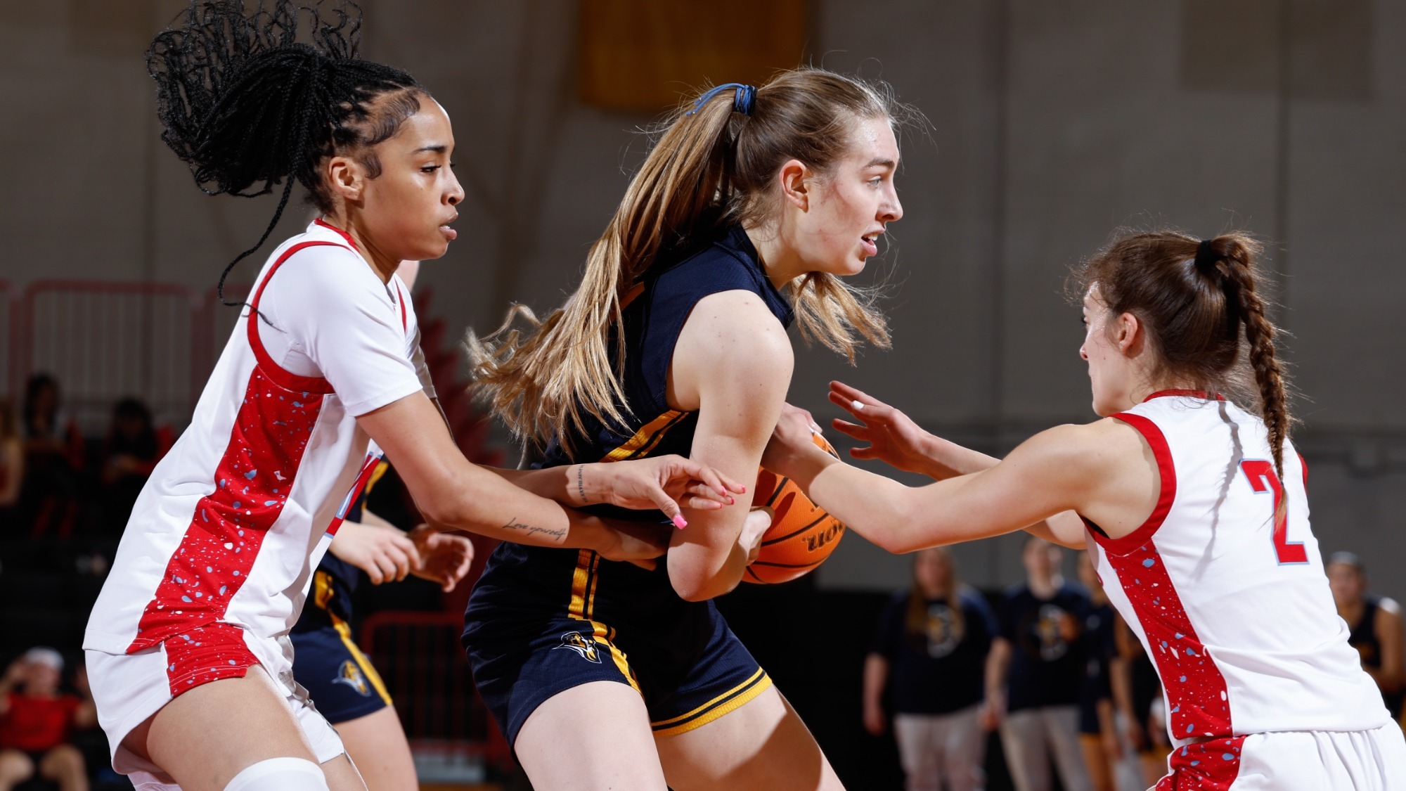 Alaya Redditt and Dolly Smith battling for the ball against CCIW opponent Augustana College on Feb. 4, 2026.