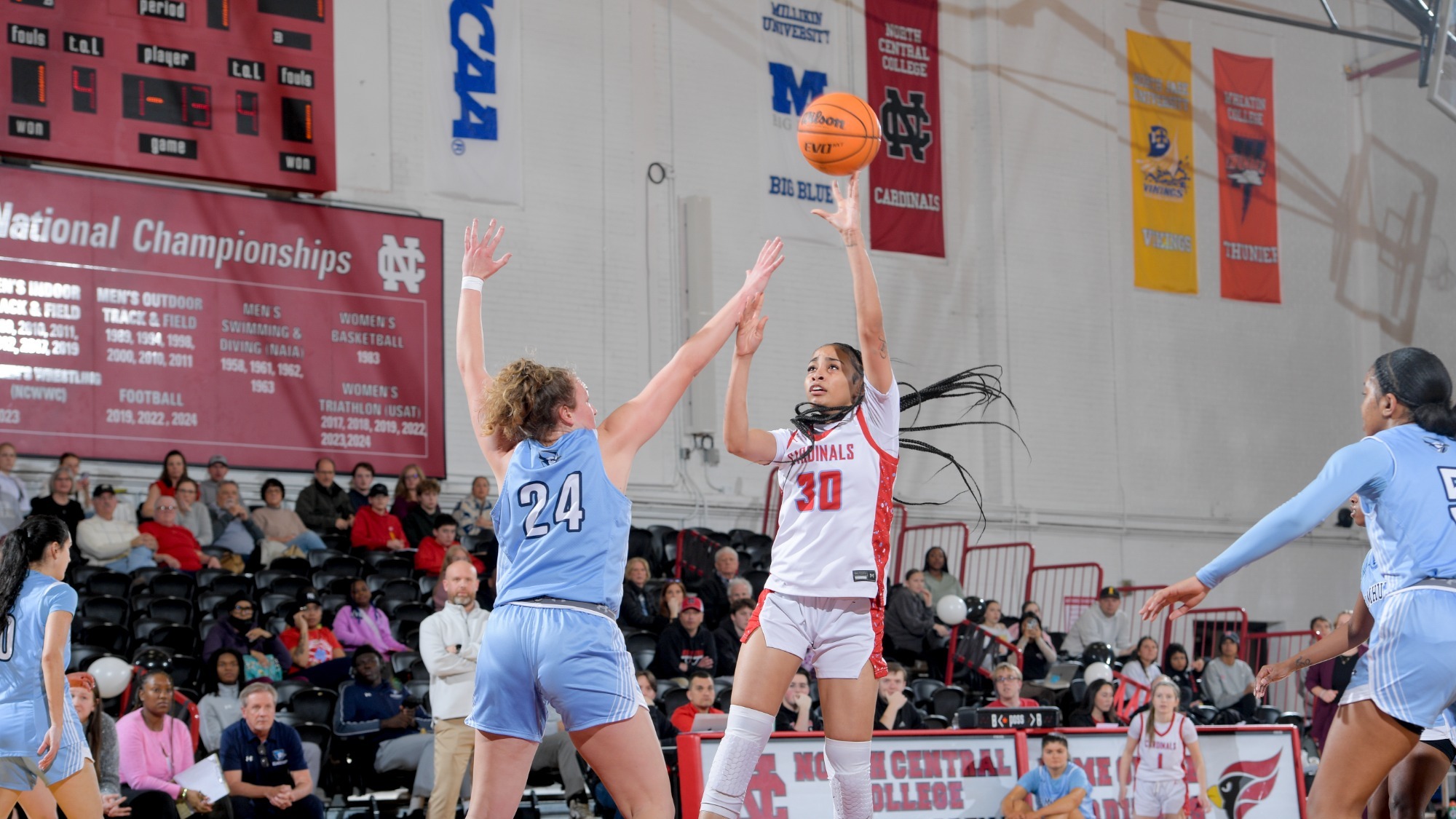 Alaya Redditt putting up a shot against her Elmhurst University defender on Feb. 14, 2026.