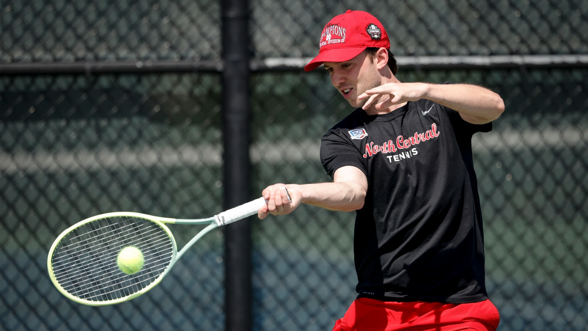 Matt Crossland returns a shot using a forehand stroke. 