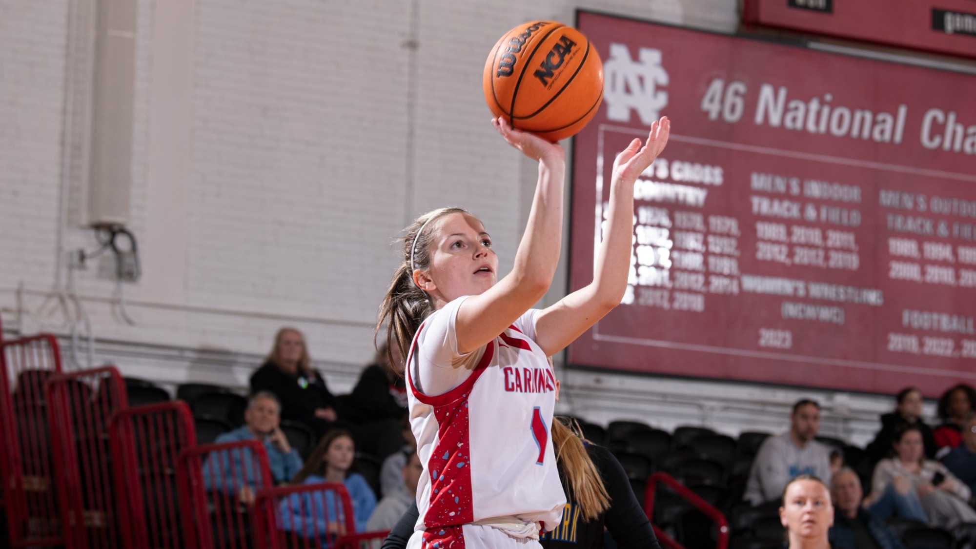 Cate Uhren shooting a three against North Park University in a CCIW matchup on Jan. 18, 2026.