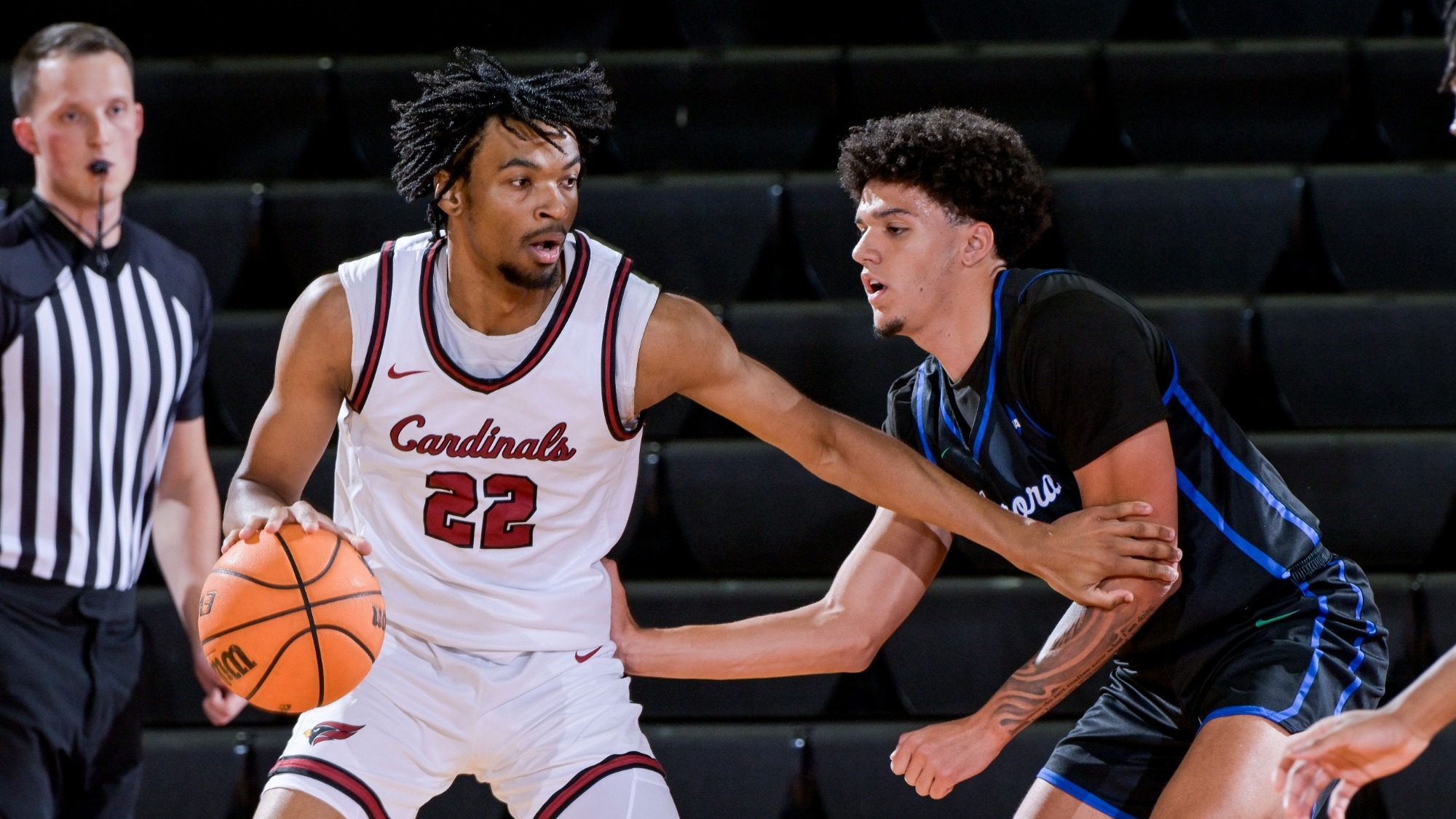 James Bullock Jr. backing down an Aurora defender