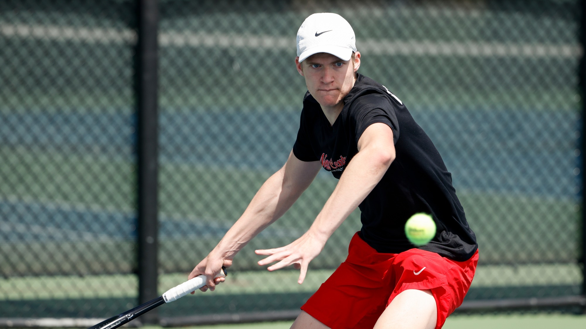 Philipp Wottgen prepares to make a forehand return shot during a match