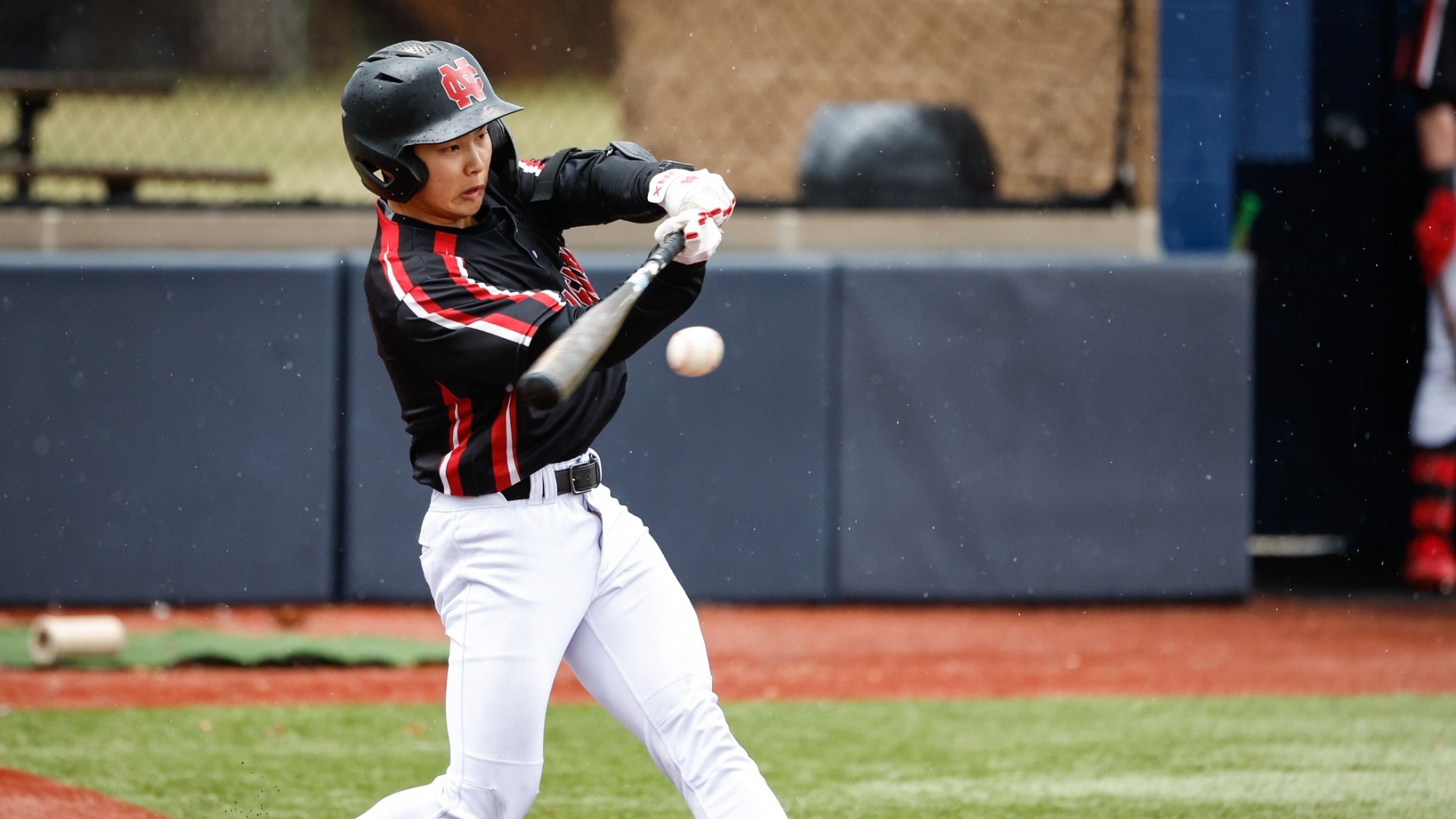 Yuhki Yamada hitting the baseball