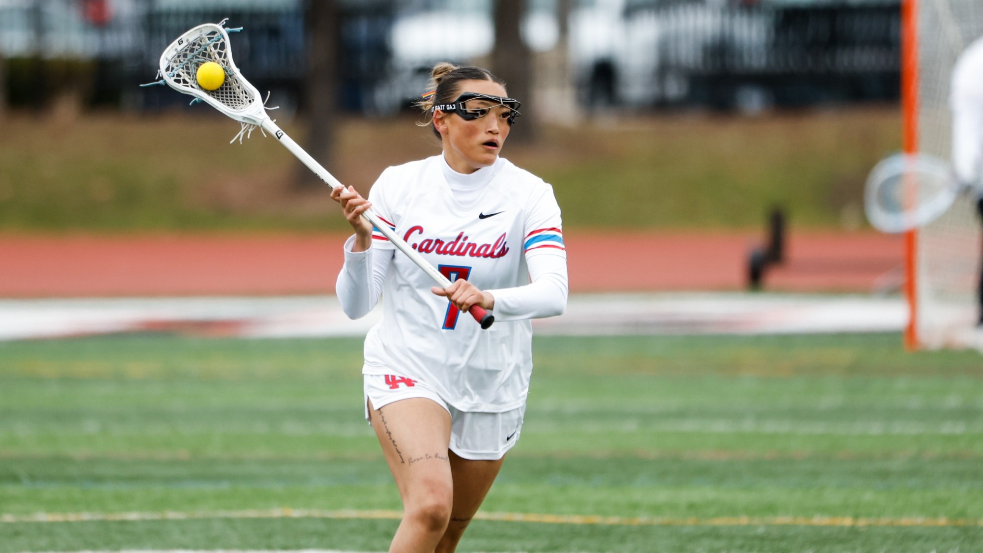 Anaise Kaufman carrying the ball for the North Central College women's lacrosse team against the Illinois Institute of Technology women's lacrosse team on Mar. 10, 2026.