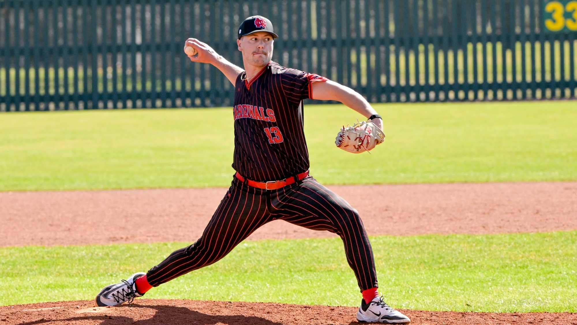 Elijah Hammond pitching a fastball vs Calvin
