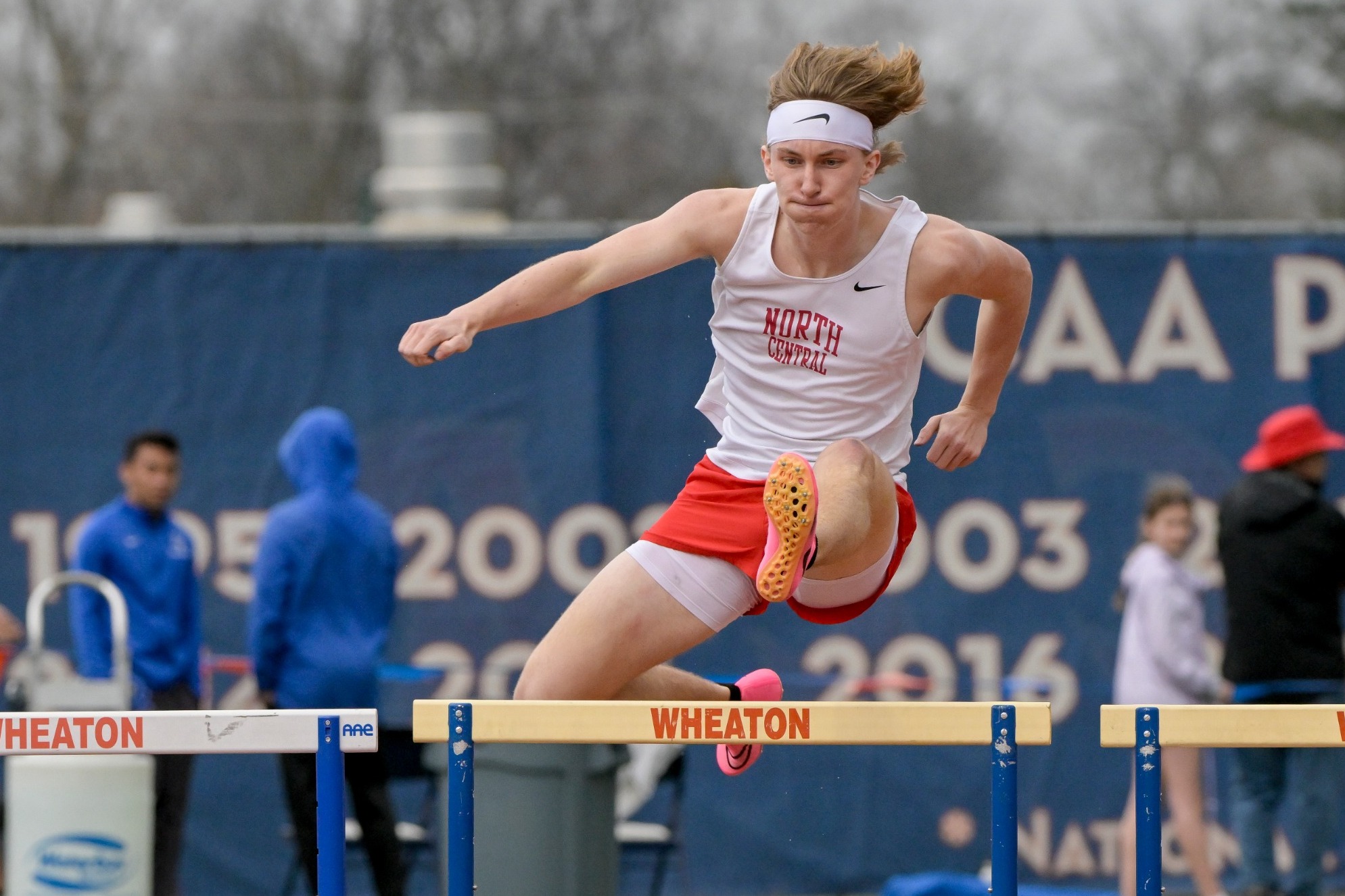 Grant Bond hurdling at Wheaton College