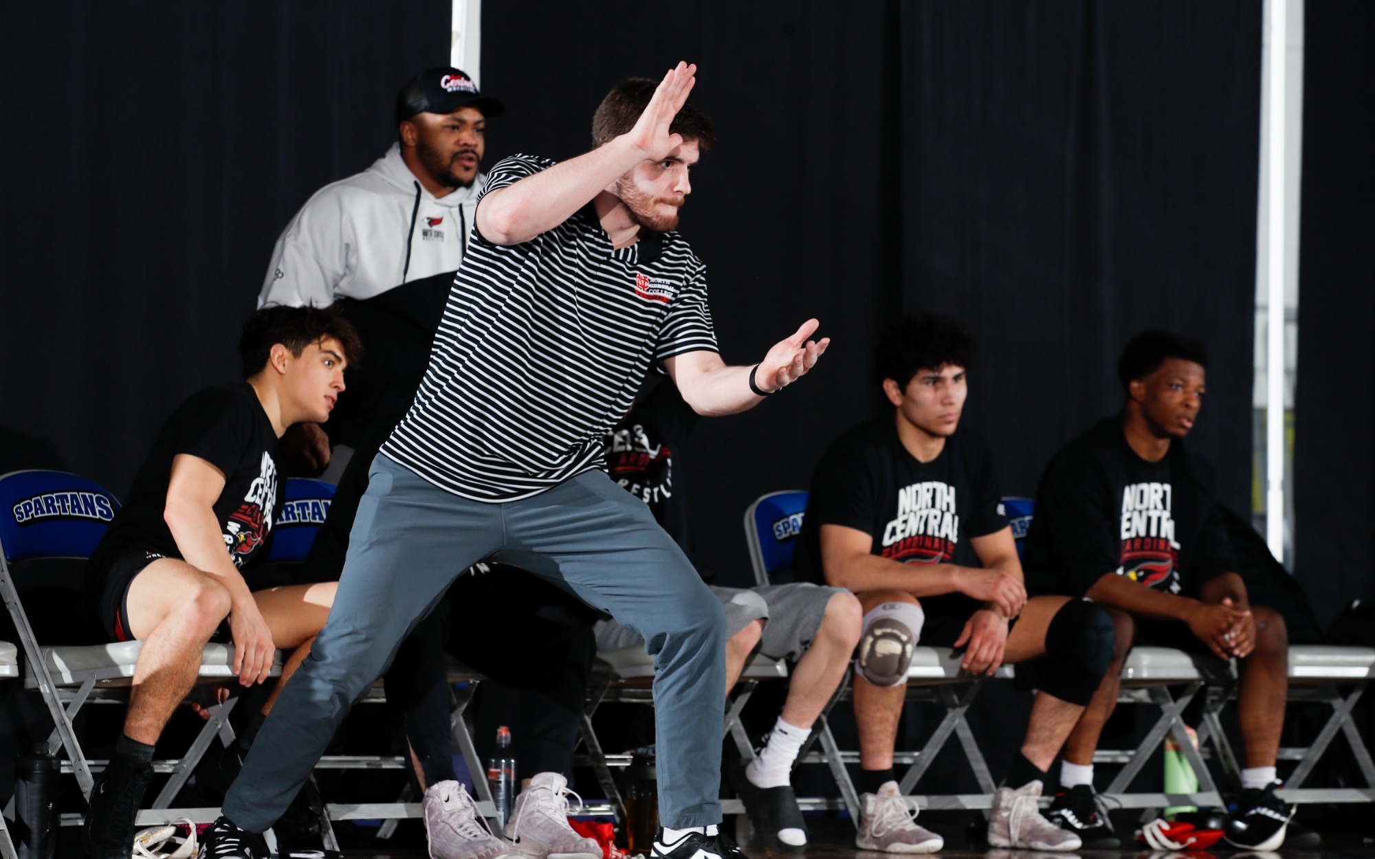 Coach Robby Bates at NCC vs Aurora Dual