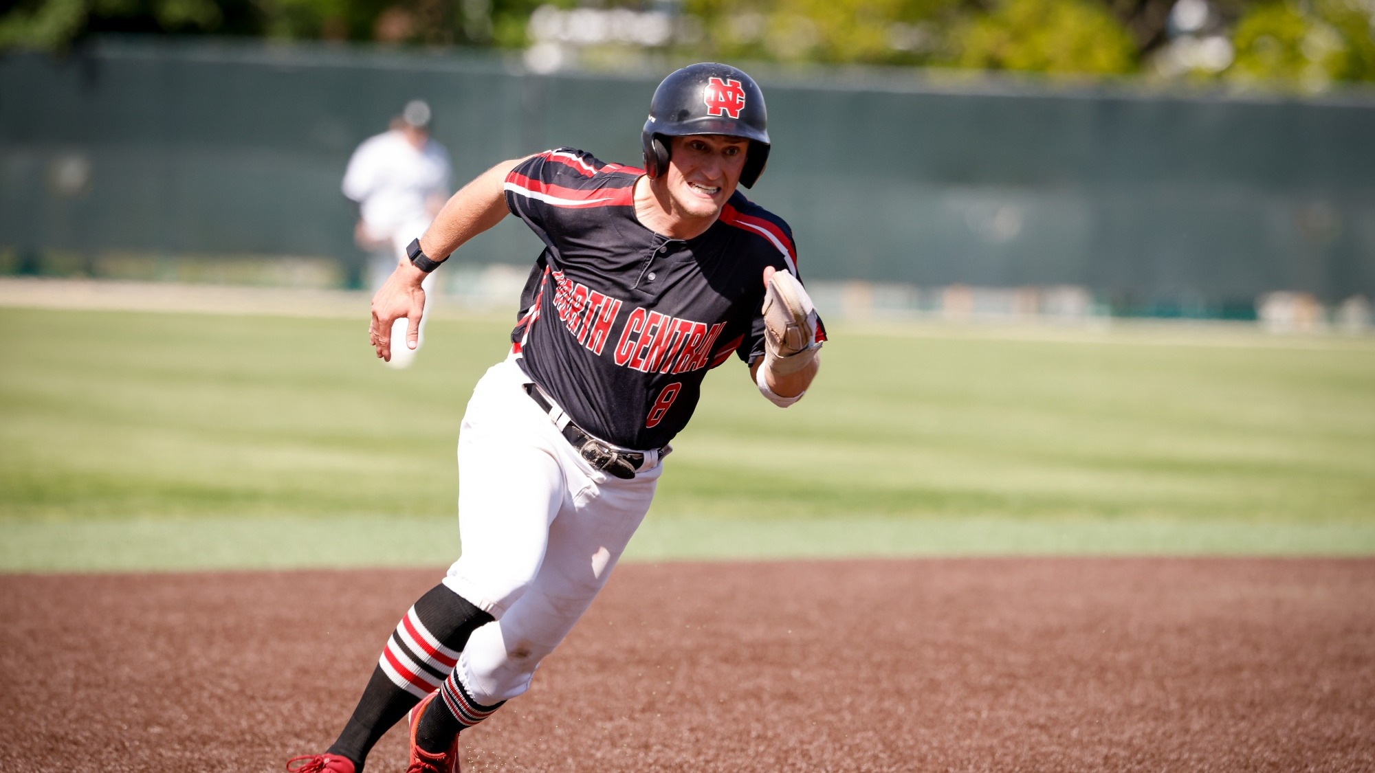 Parker Wyatt hustling around second base hoping to score