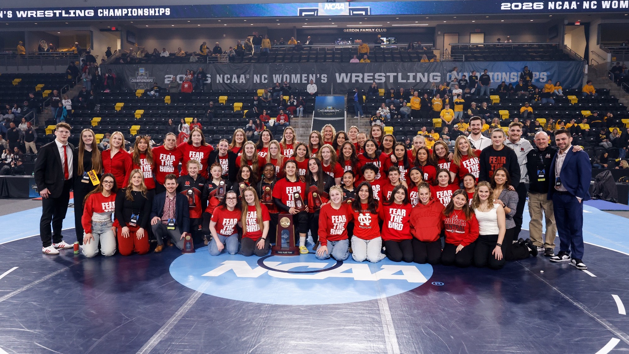 Women's Wrestling with third place NCAA trophy