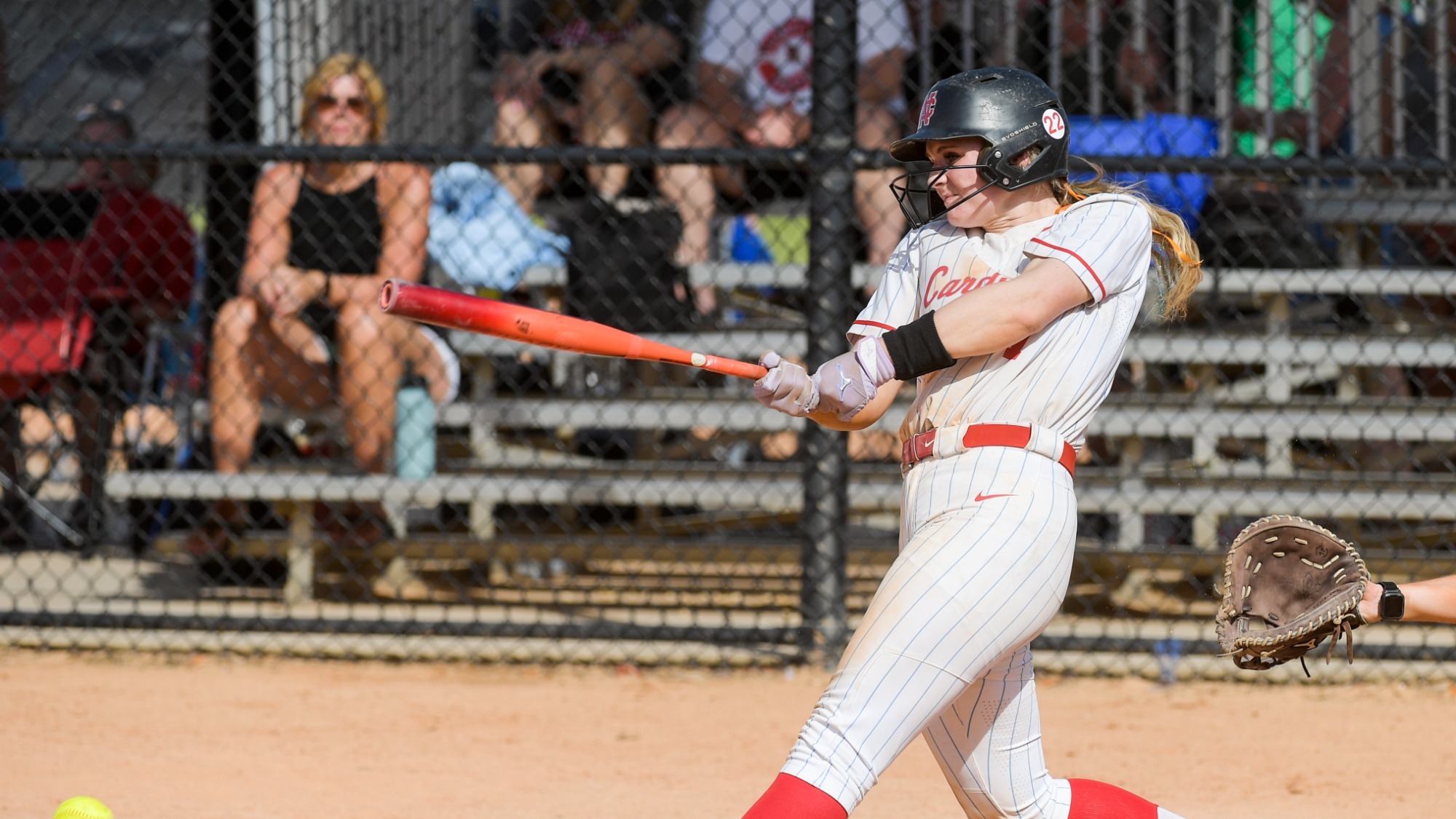 Lauren Bowmar hits ball at THE Spring Games