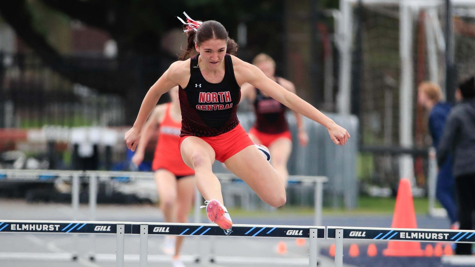 Alivia Henkel running 400m hurdle homestretch