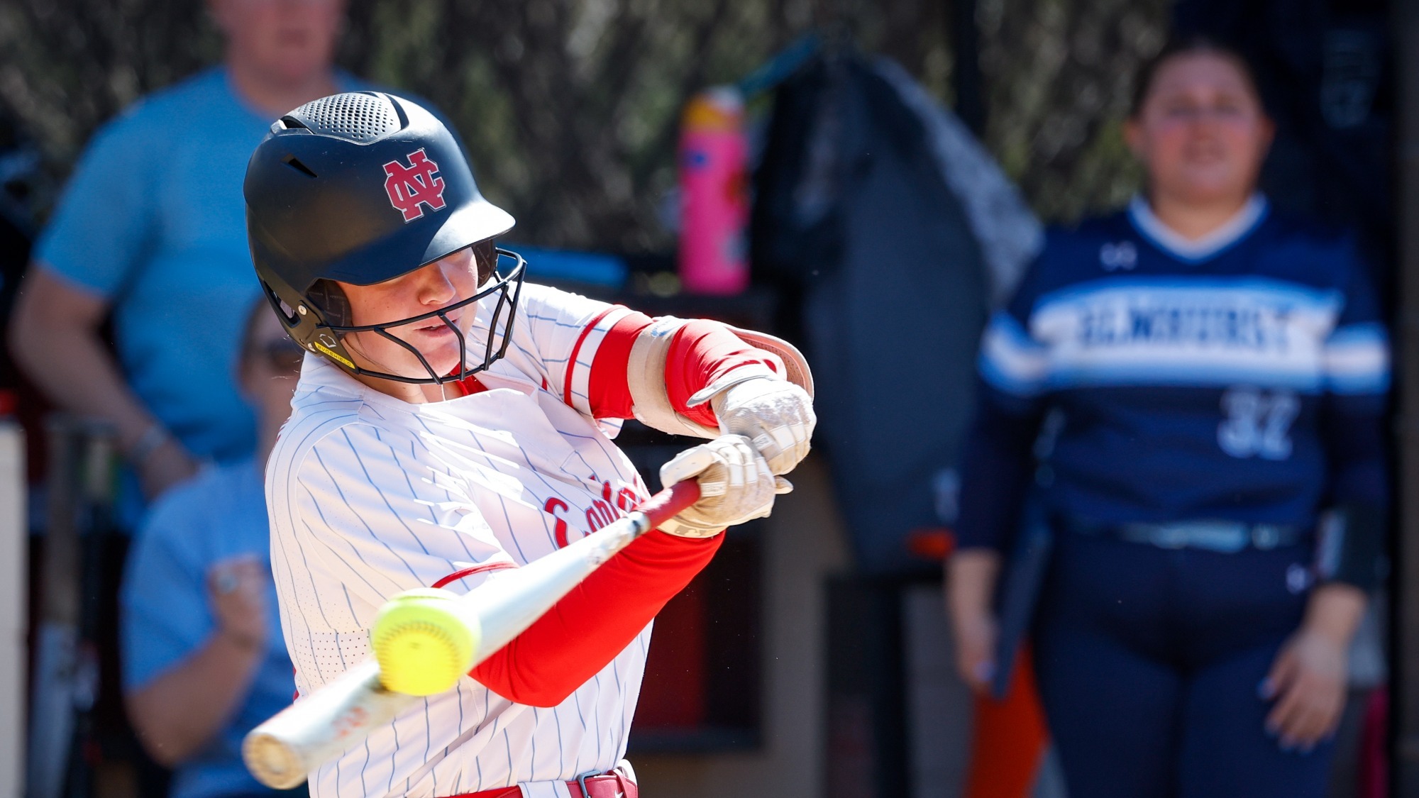 Hailey Morsovillo hits the ball against Elmhurst