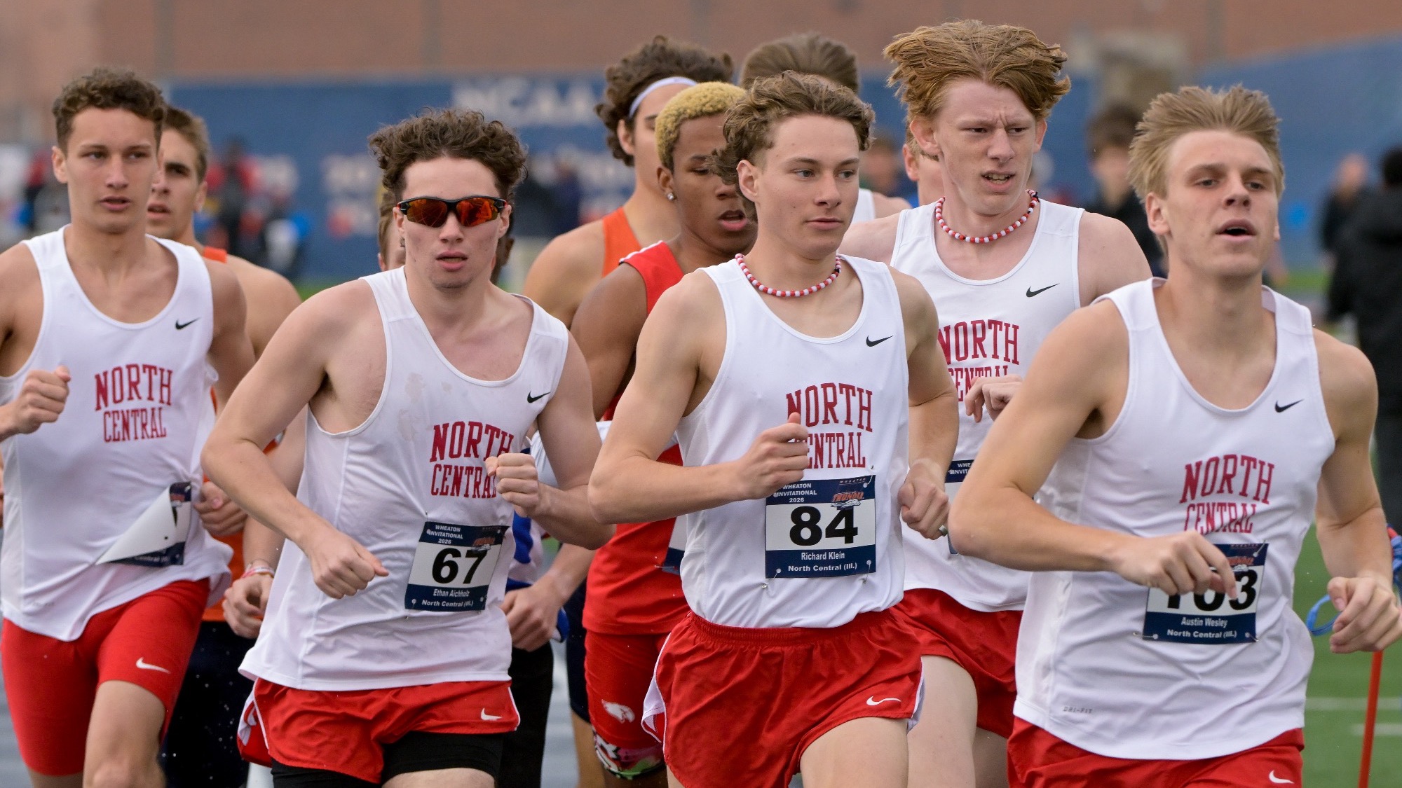 North Central Distance runners racing at Wheaton
