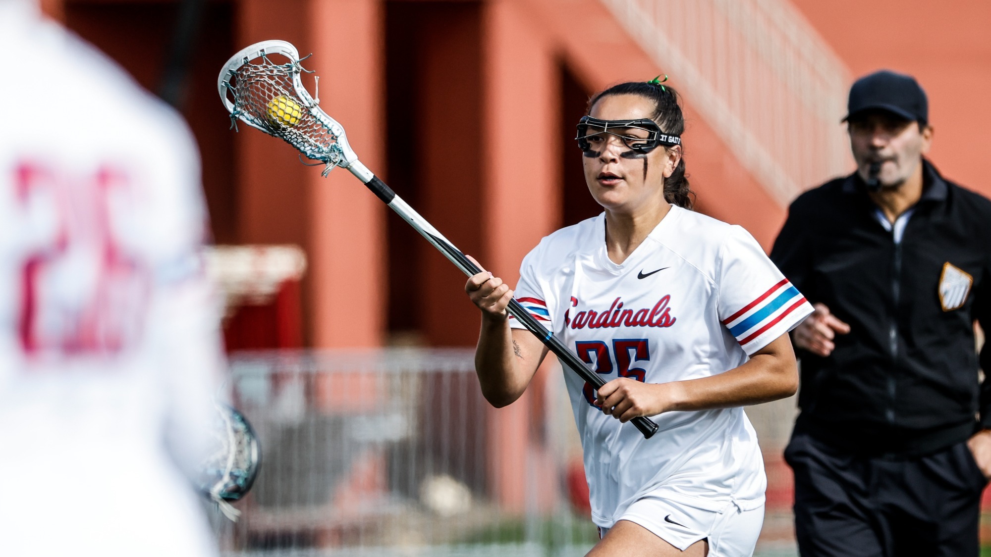 Rachel Lawrence dodging her Elmhurst University defender on Apr. 18, 2026.