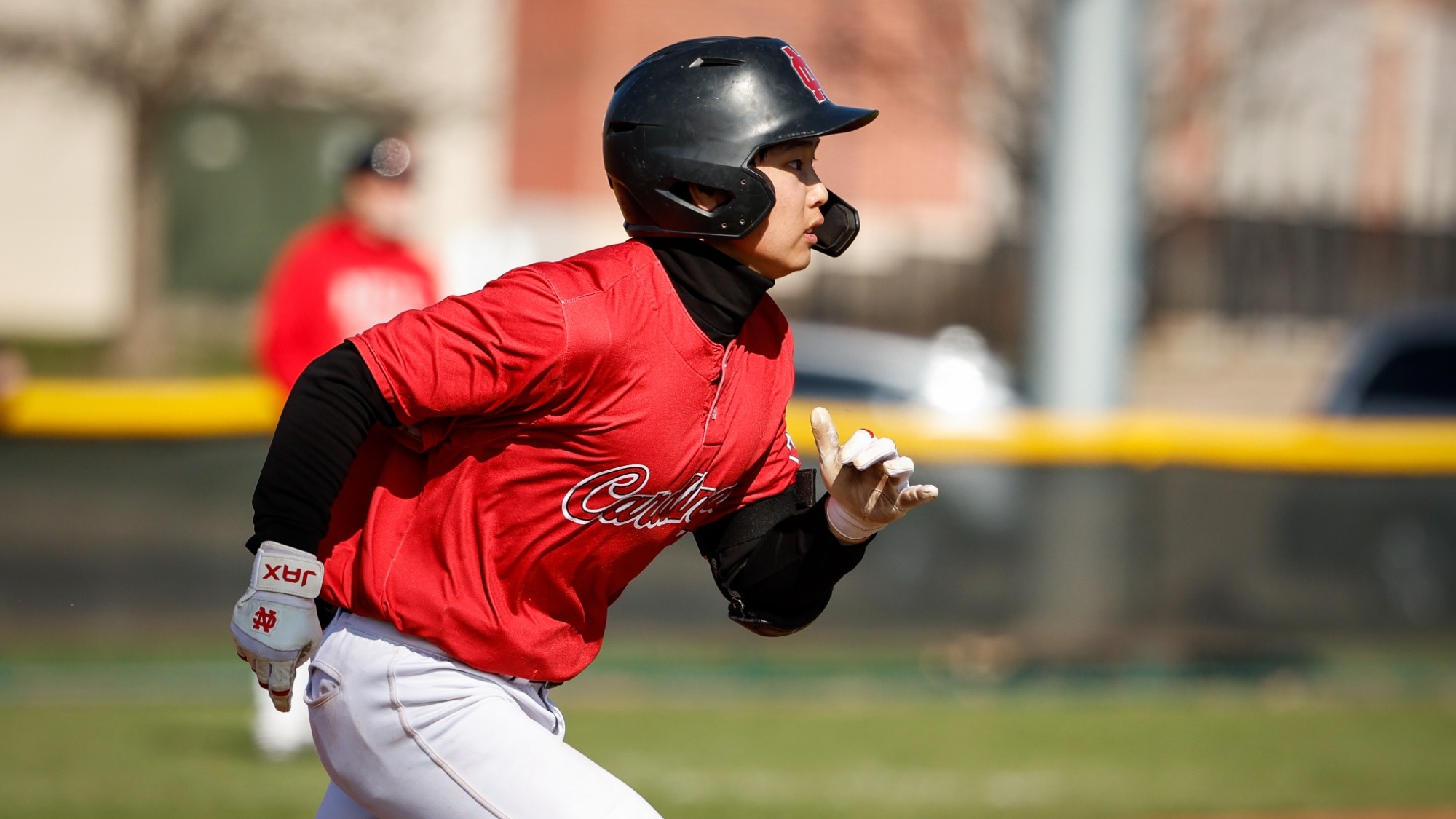 Yuhki Yamada runs to first after a basehit
