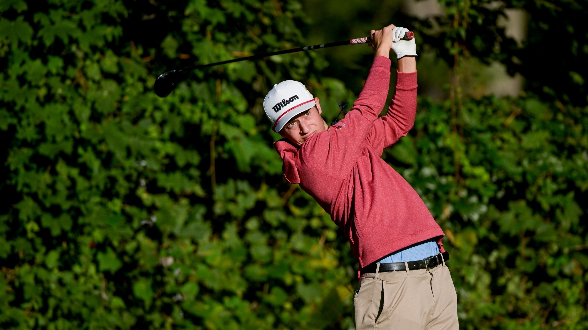 Jake Delaney hitting his driver off the tee box at the Aurora Invite