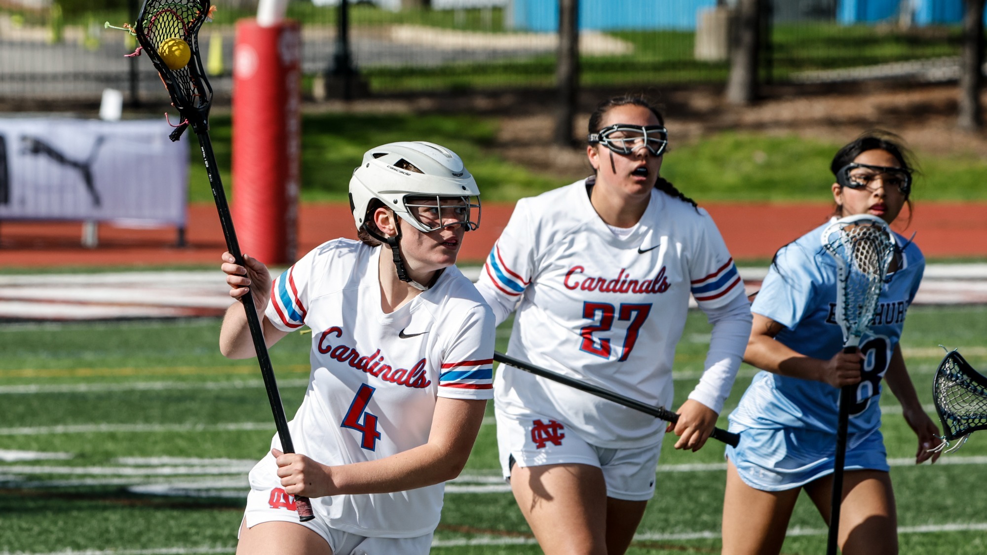 North Central College women's lacrosse athlete Madeleine Diamond running the ball down the field on Apr. 18, 2026 against Elmhurst University.