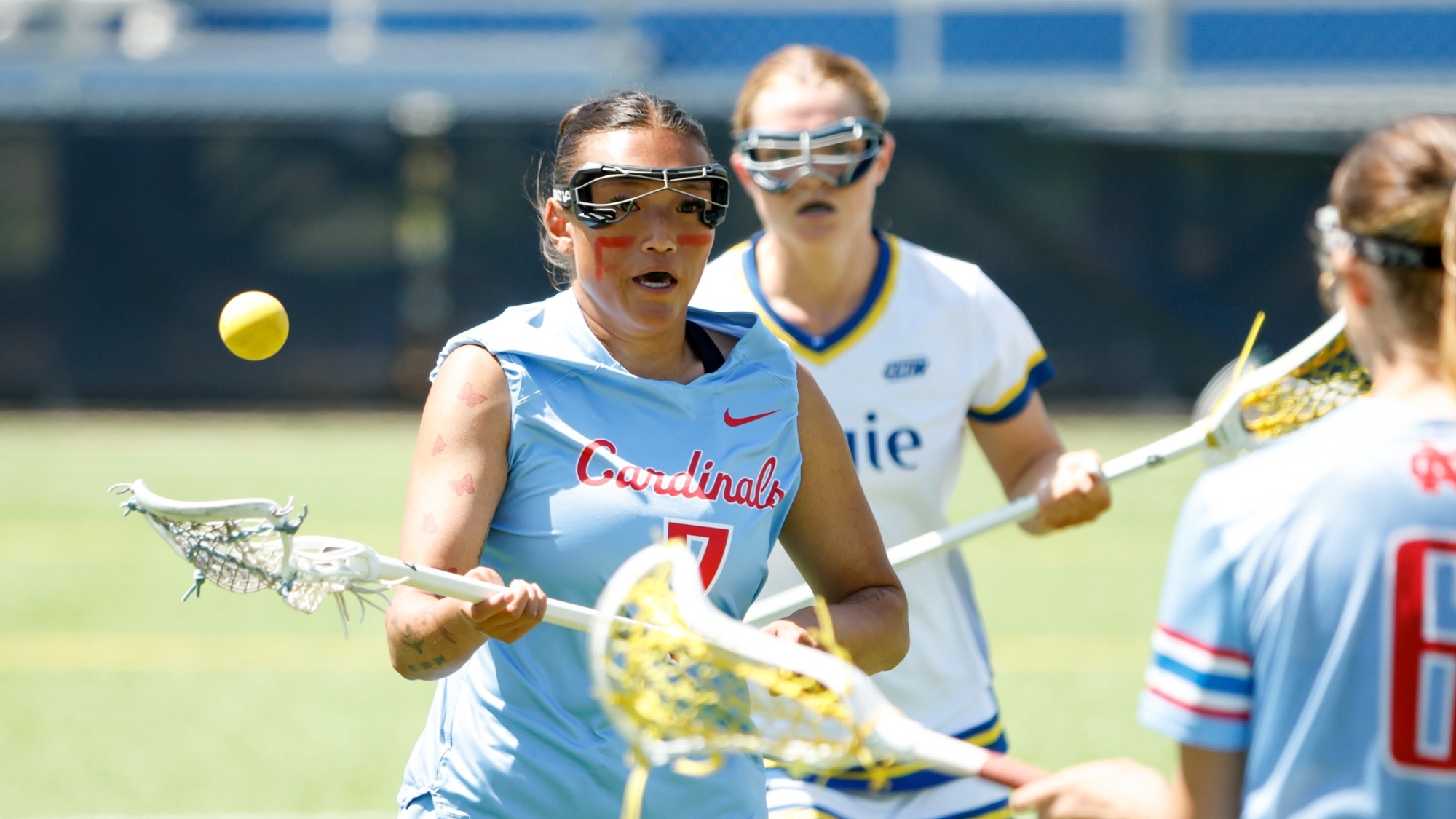 North Central College women's lacrosse athlete, Anaise Kaufman, receiving the ball from her teammate against Augustana College on Apr. 25, 2026.
