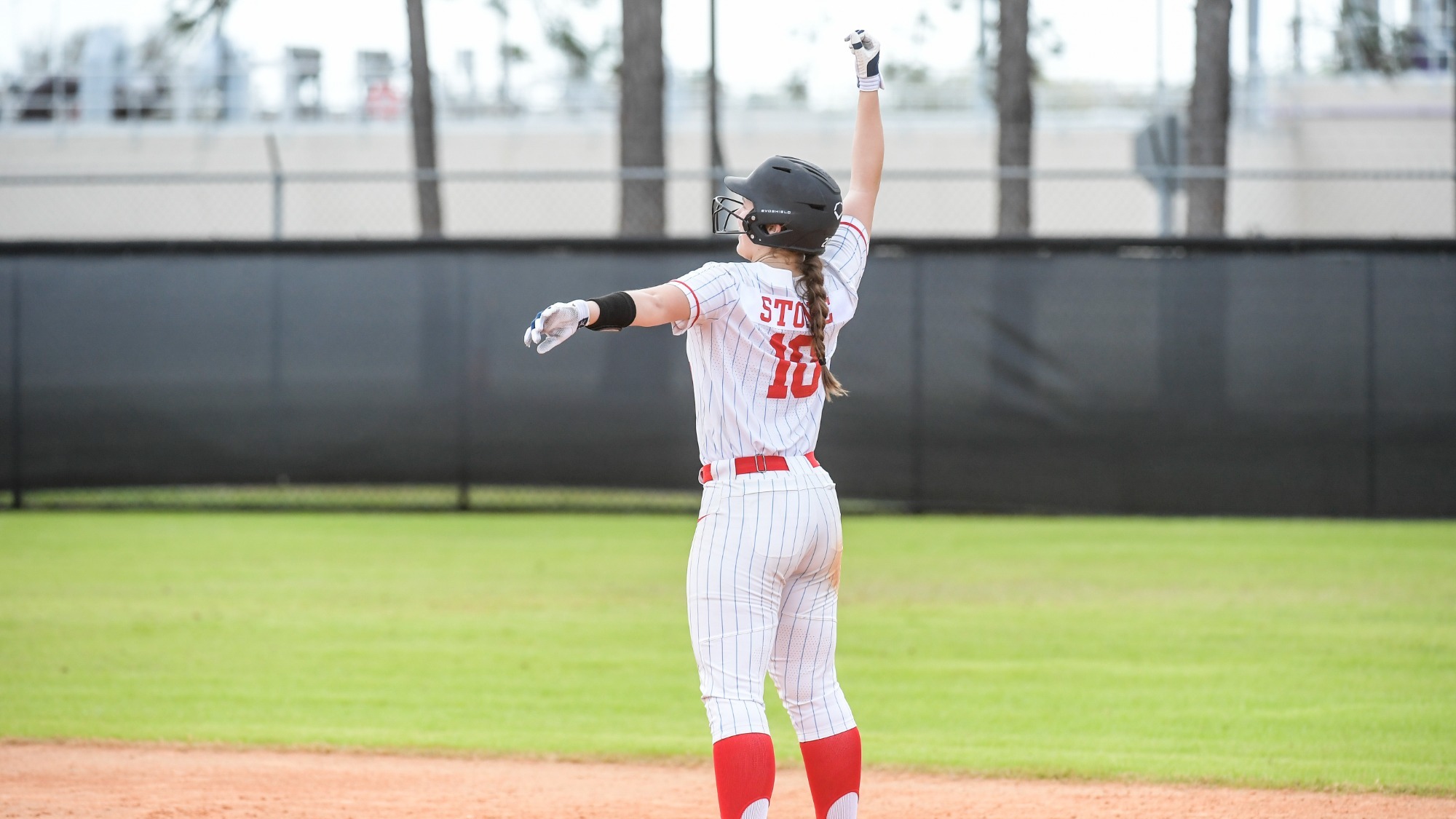 Nicole Stone celebrates a base hit