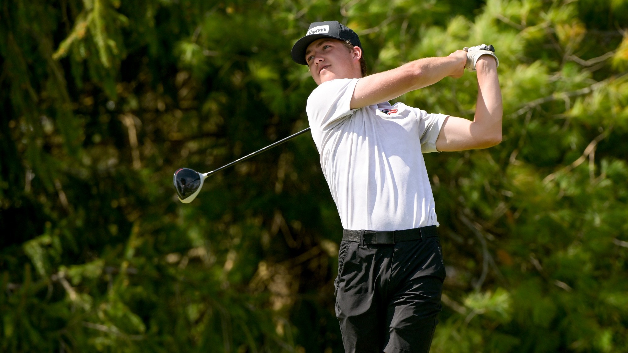 Tre Wienke swinging a driver at the CCIW Preview