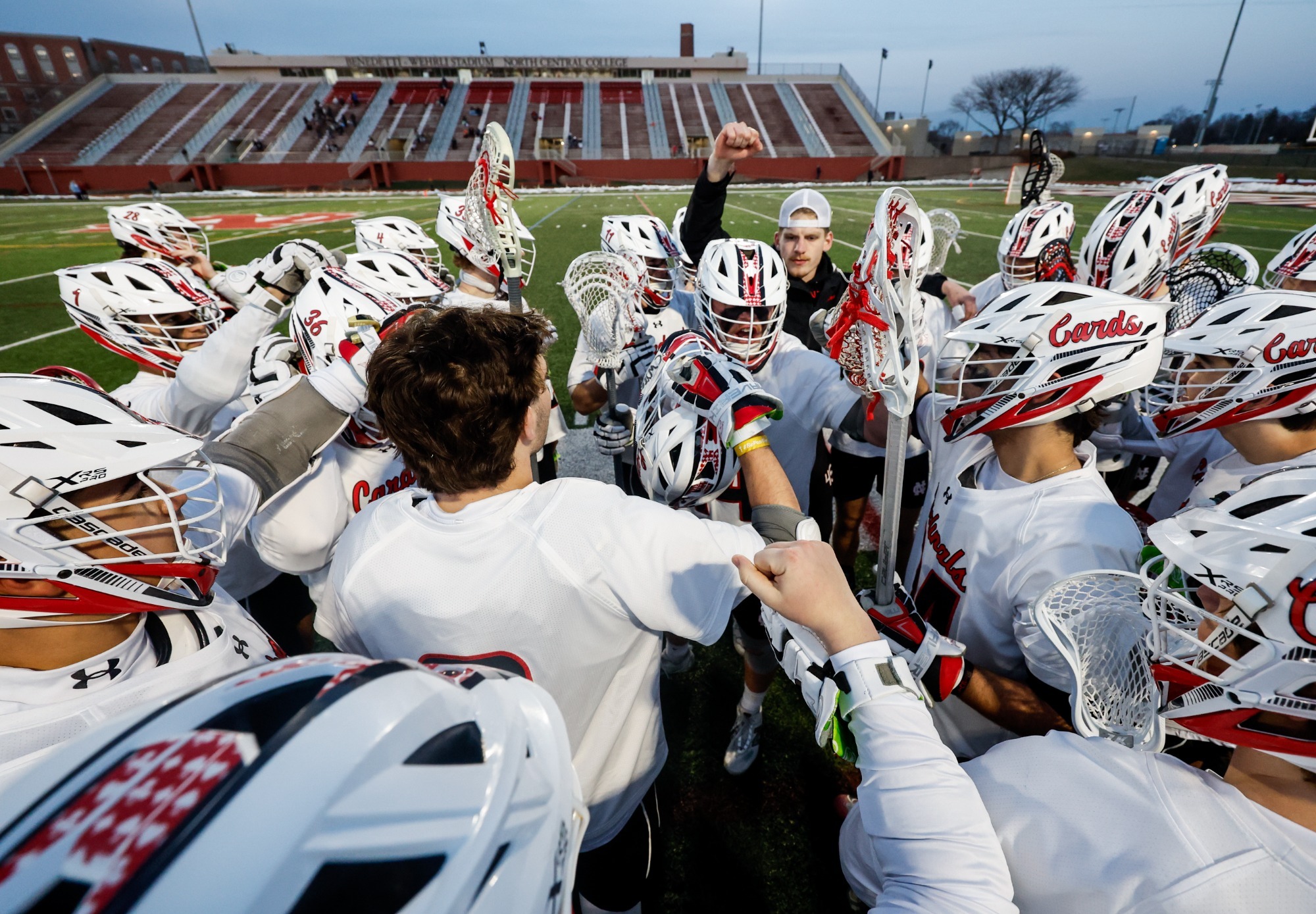 Men's Lacrosse breaks team huddle against DePauw
