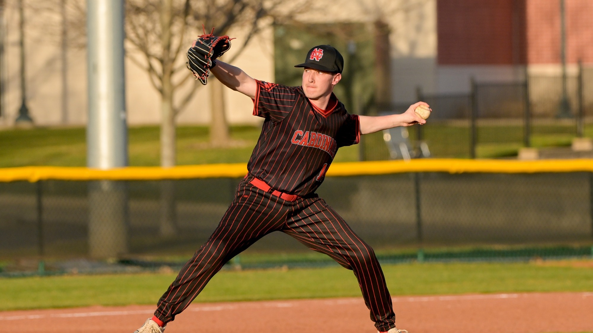 Tyler Pritchard throws a pitch vs Calvin