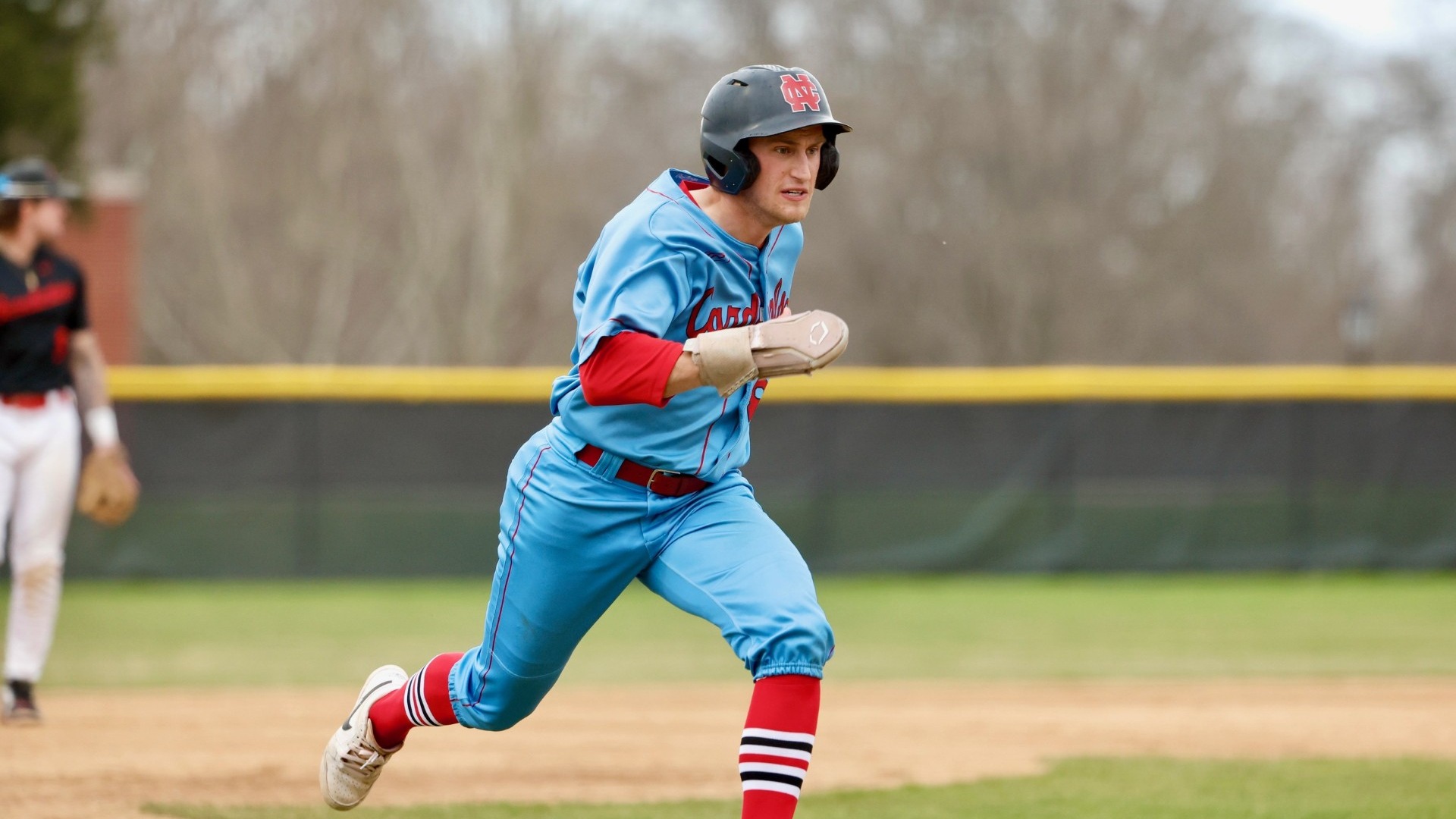 Parker Wyatt sprinting to home plate vs Benedictine