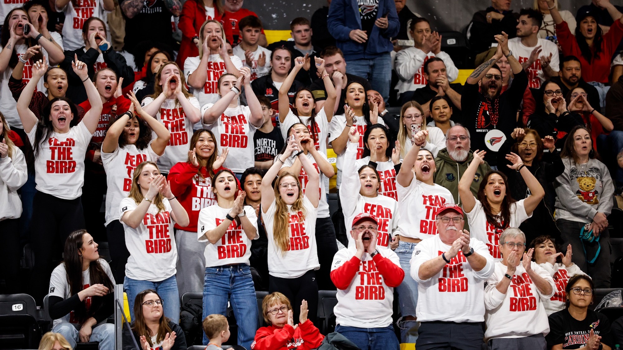 NCC wrestling fans cheering at nationals