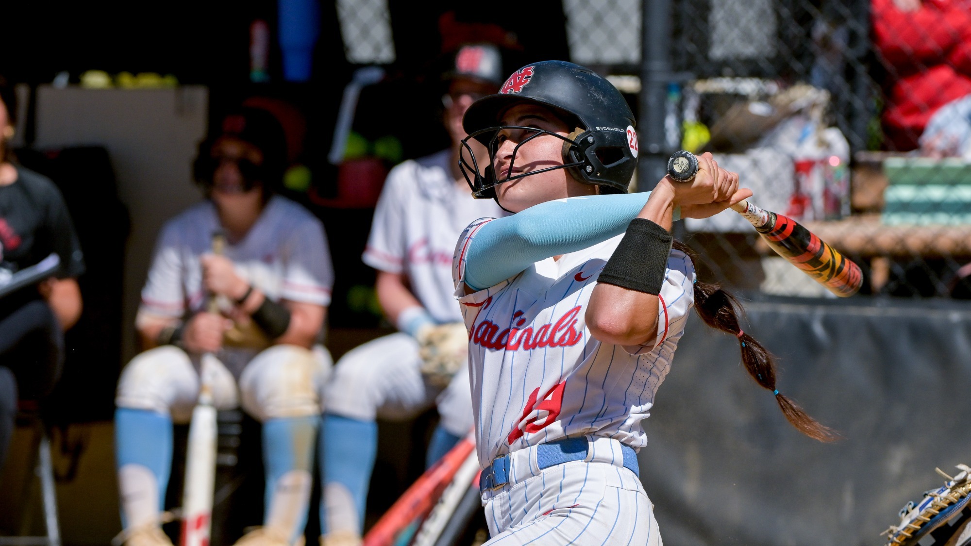 Bailey Miller looks at her home run