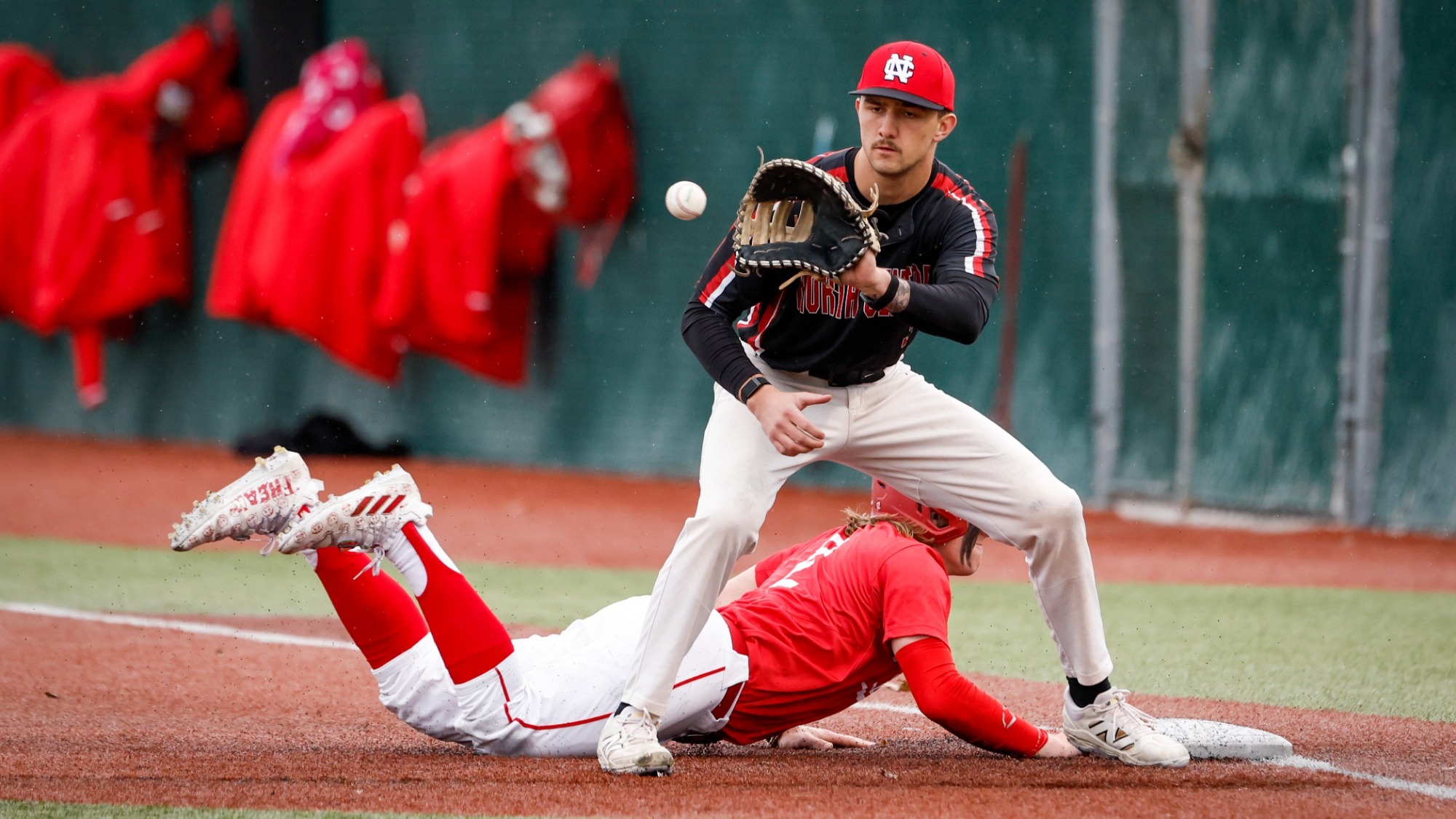 Payton Diaz catching a pickoff attempt at first base
