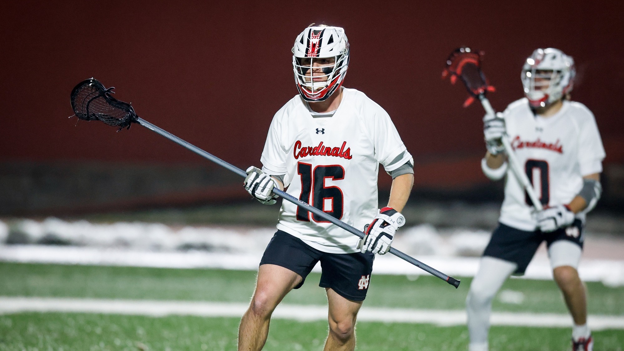 Alex Porter looks to defend against DePauw