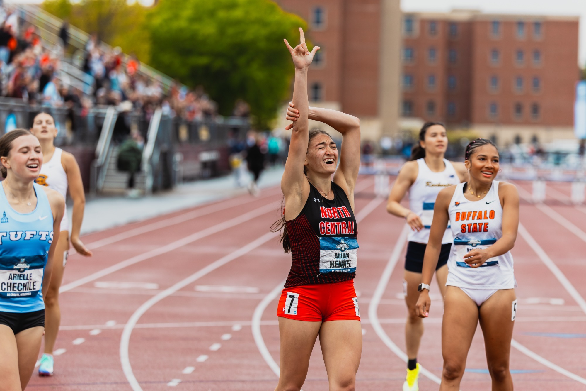 Alivia Henkel celebrates NCAA 400m hurdle win at finish line