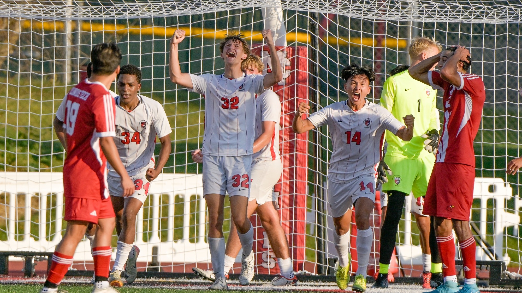 North Central College men's soccer team celebrating after a goal during the 2025 season.