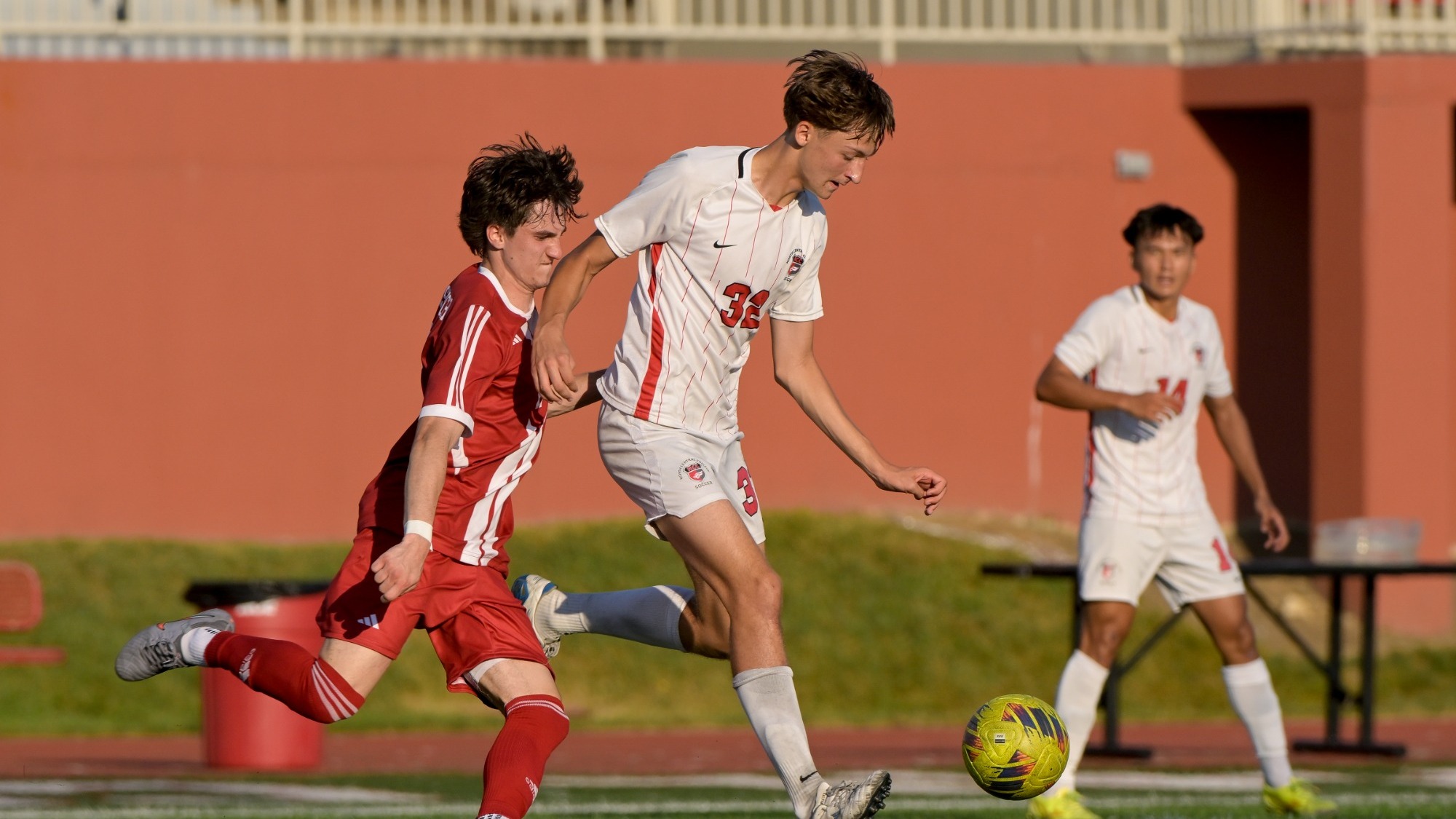 Aleks Duncevic passing the ball after beating his Illinois Institute of Technology defender during the 2025 season on Sept. 14.