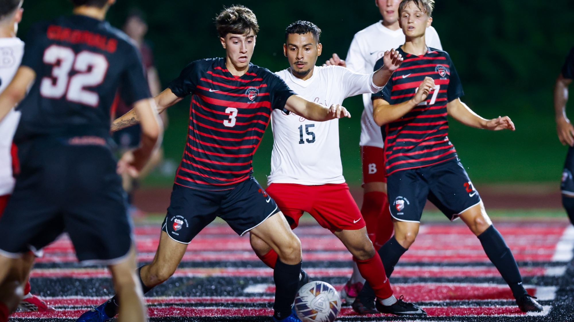 Lorenzo Monticelli from North Central College men's soccer team winning the ball against Benedictine University in their match on Sept. 3, 2026.