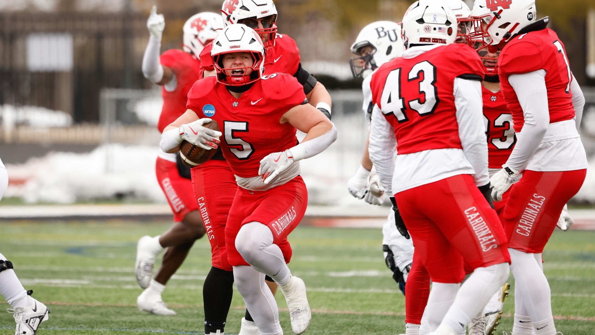 Matt Janiak Celebrates with the football after a turnover