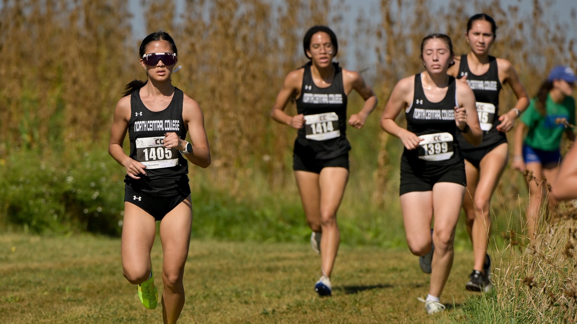 Women's Cross Country racing at Aurora Spartan Invite