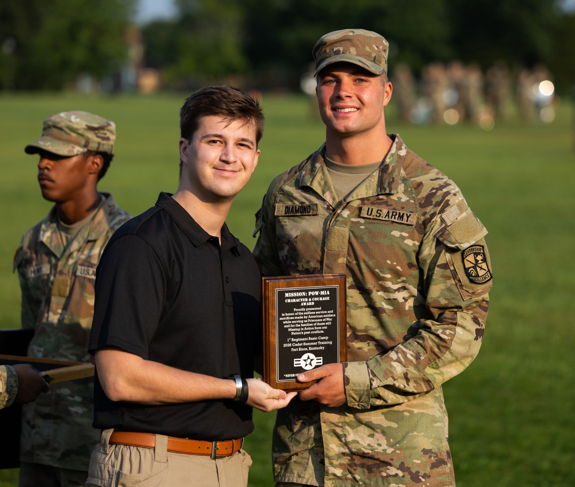 Will Diamond poses with his POW-MIA Award.