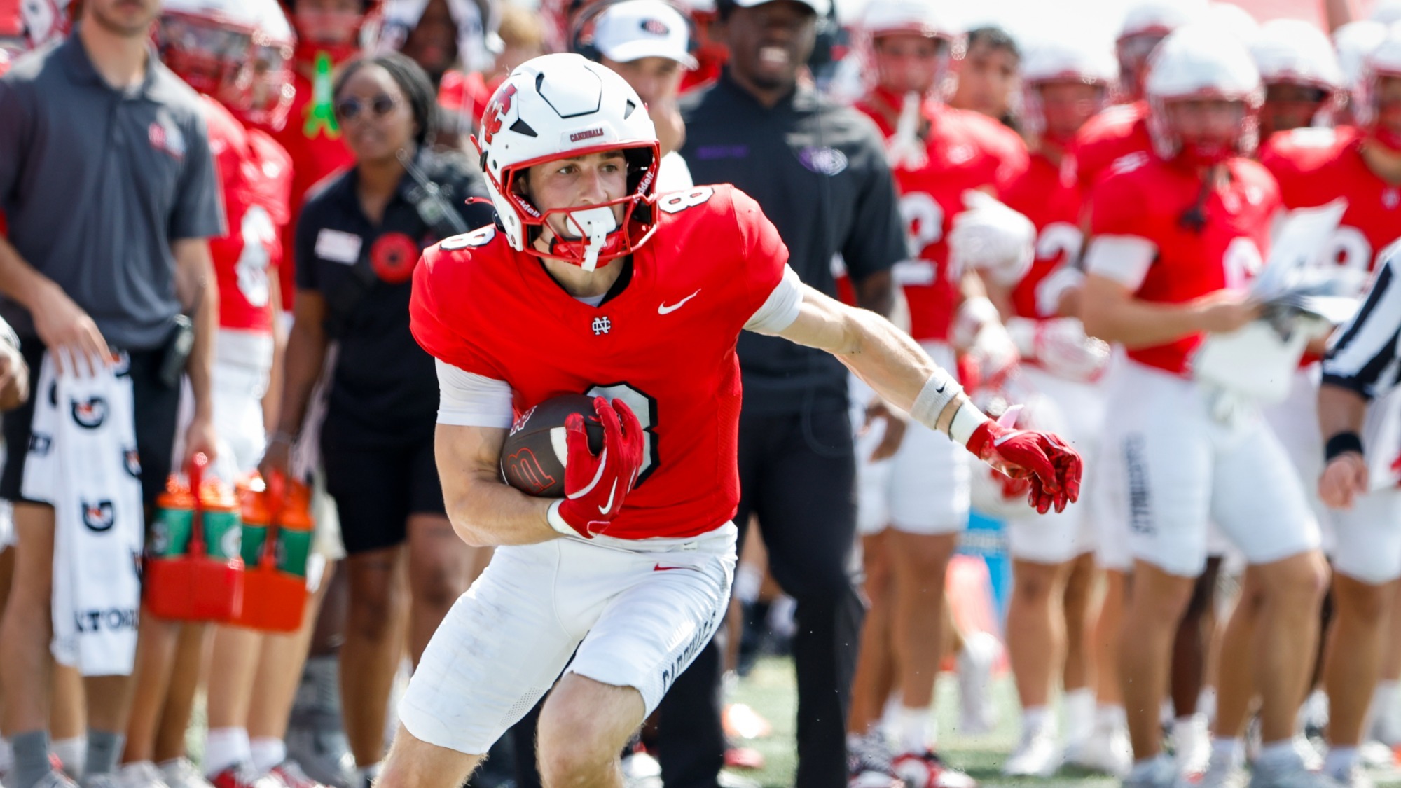 Jack Rummell runs down the sideline after a catch