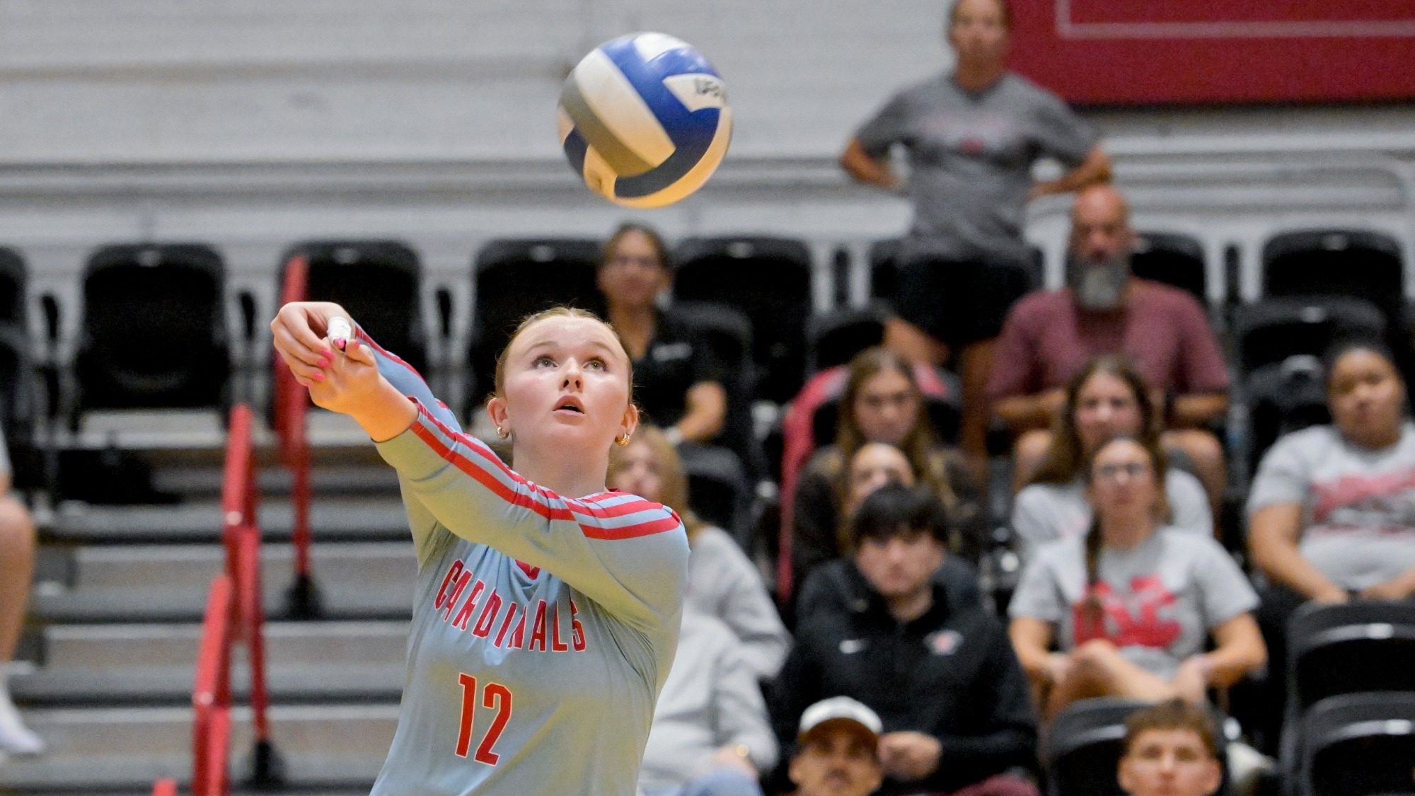 Ava Hoff digging a volleyball