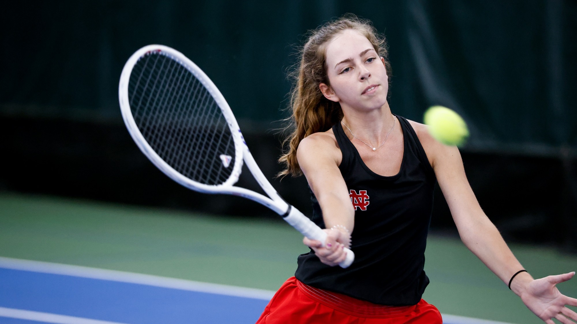 Kate Herlihy takes a forehanded shot during a practice