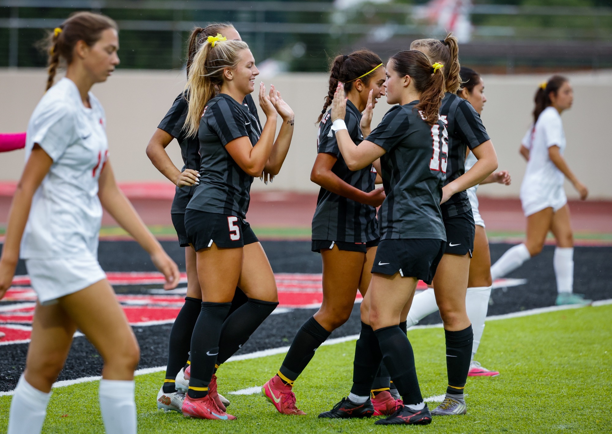 Women's Soccer celebrates a goal against Benedictine