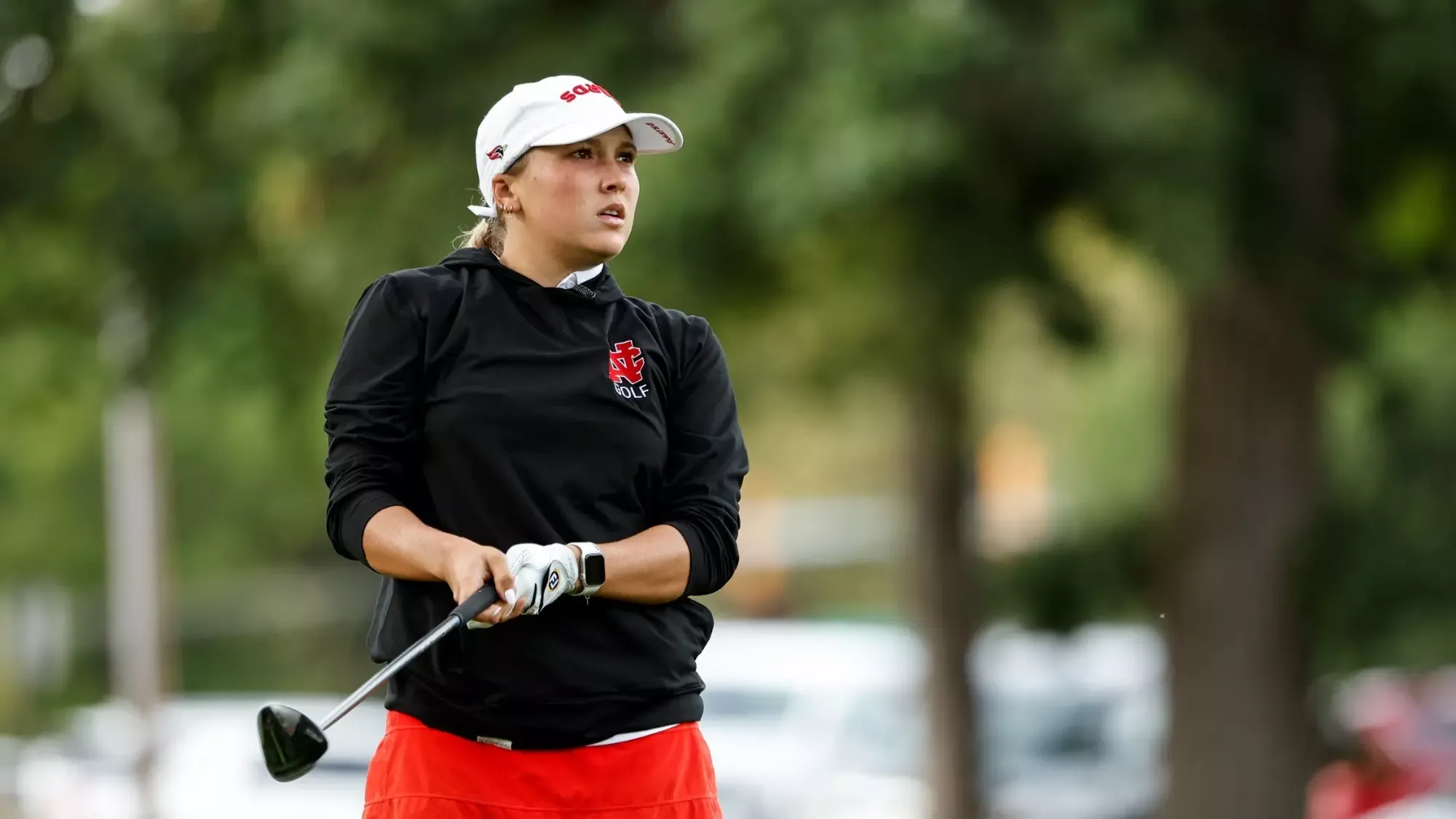 Madison Place Analyzing Her Shot From The Fairway