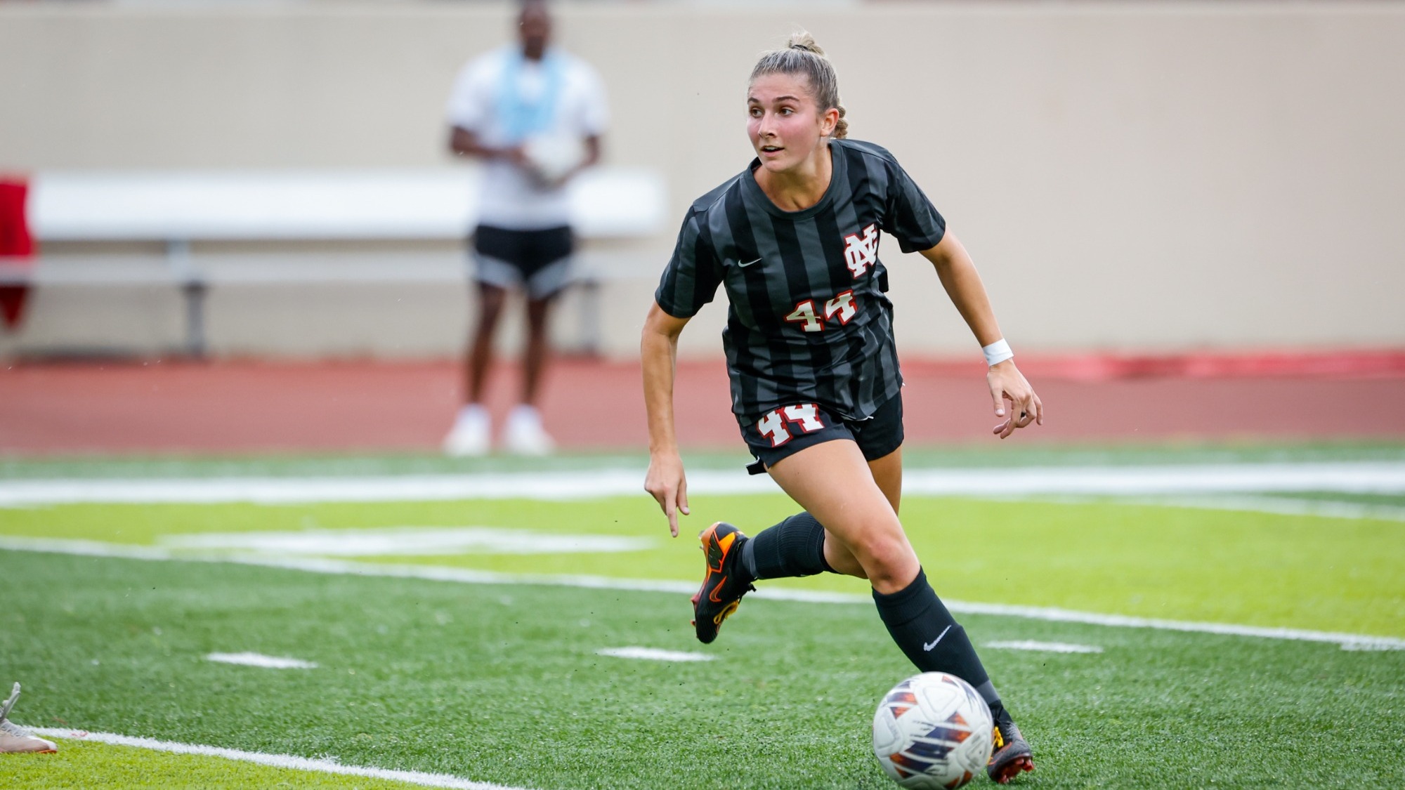 Jordan Lange looks to pass the ball against Benedictine University scrimmage